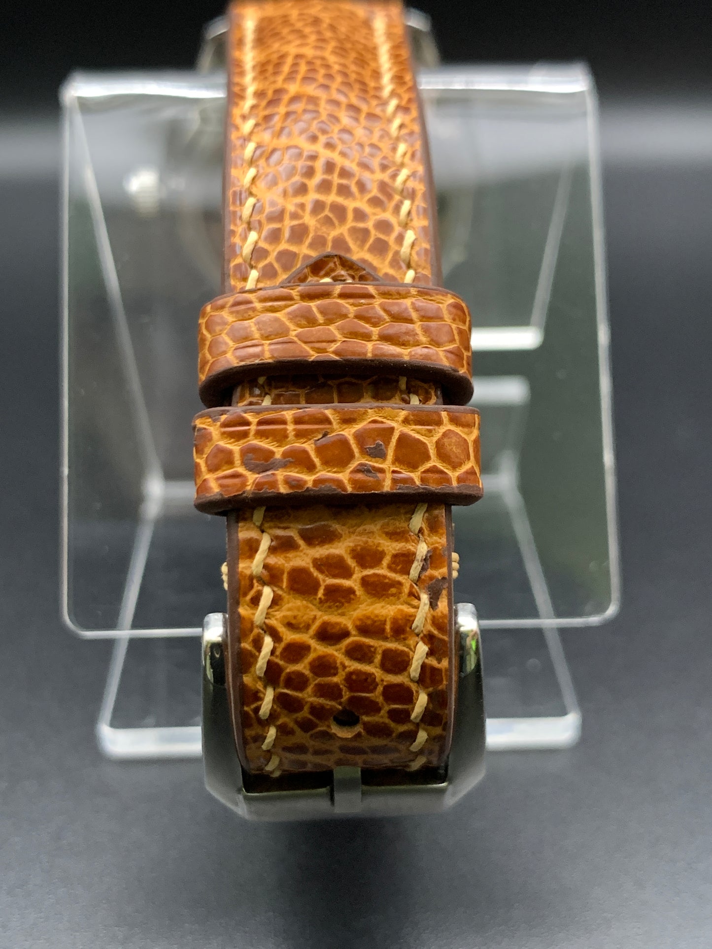33mm Golden mother of pearl dress watch. Ostrich leather strap.