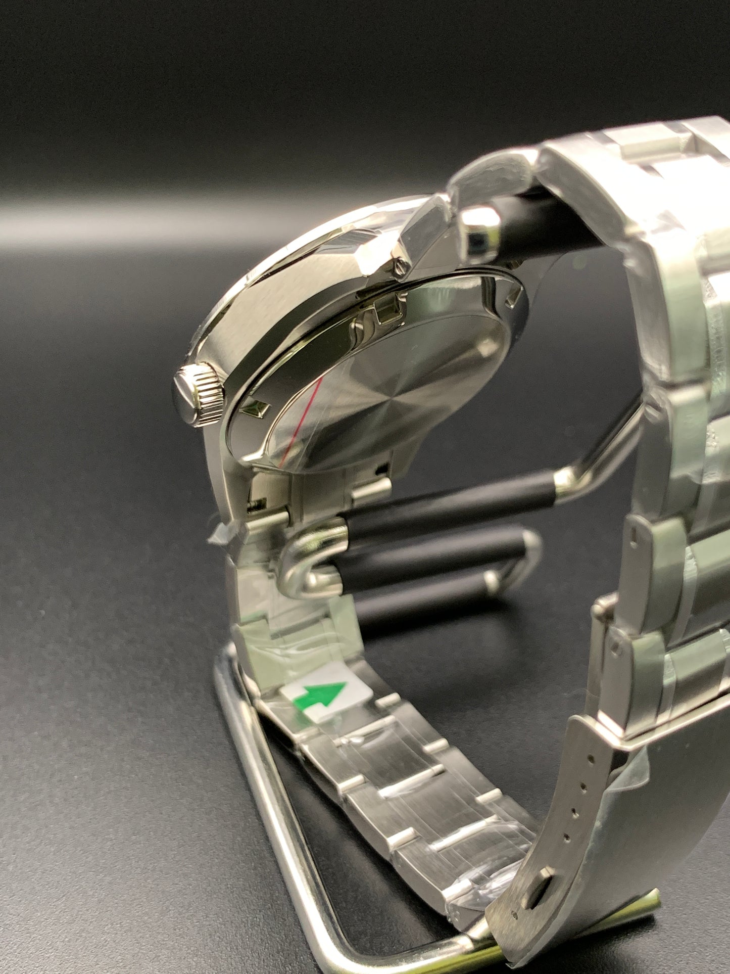 39mm Metallic shades of silver dress watch. Textured dial. Bracelet