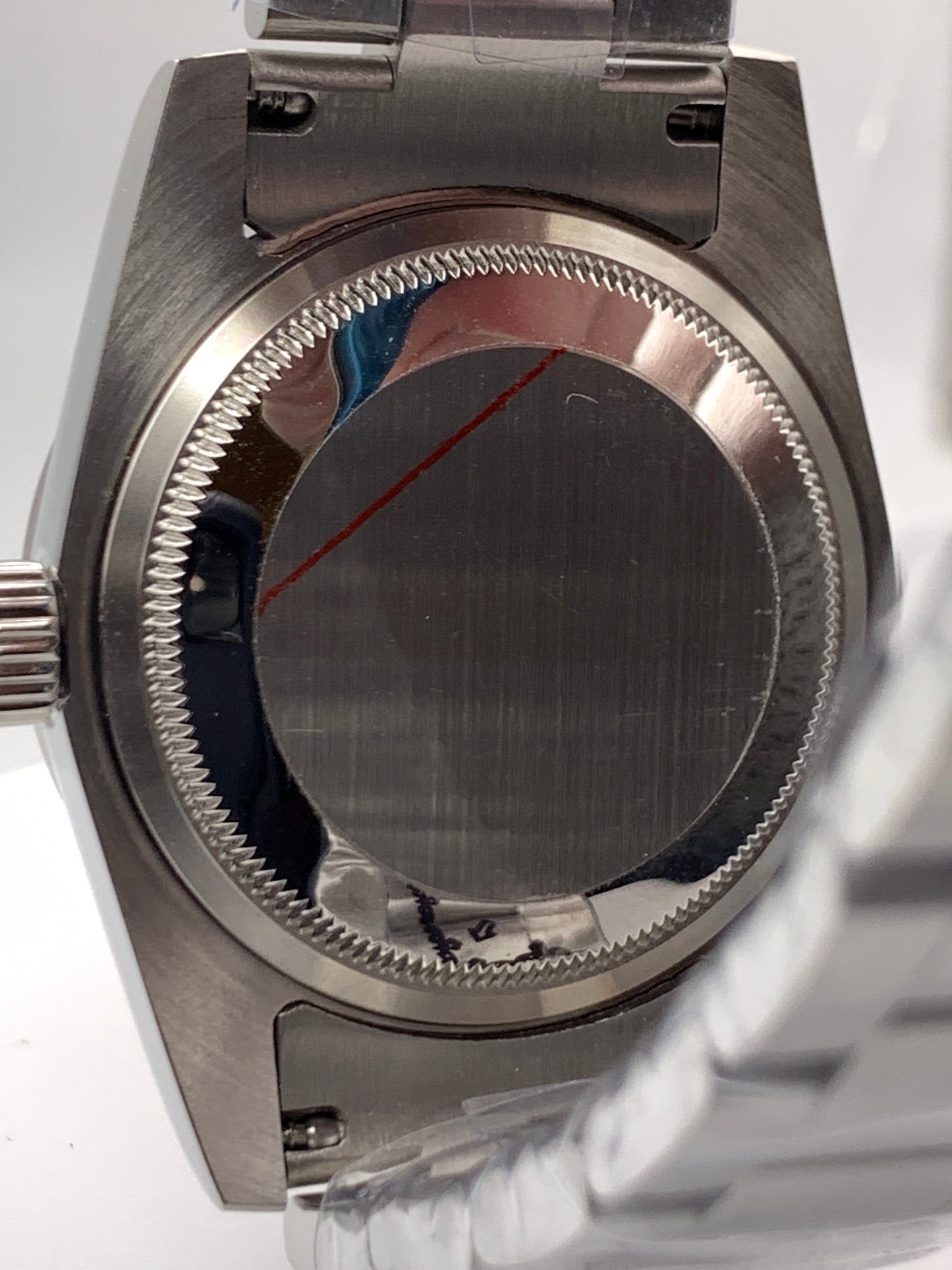 Sunbeam. 39mm stainless steel case and matching bracelet. Textured dial and unique handset. Sapphire crystal. NH38 automatic movement.