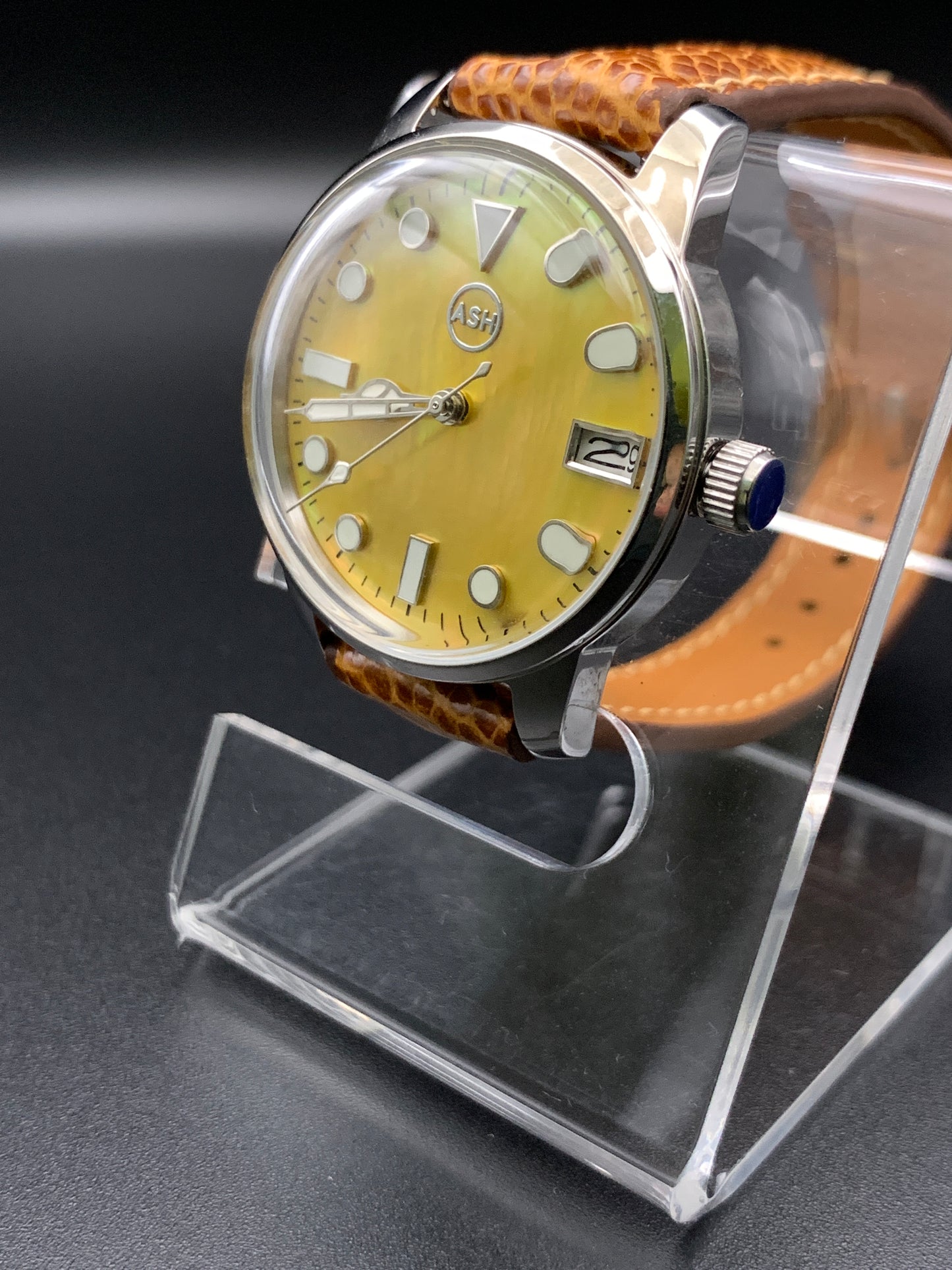 33mm Golden mother of pearl dress watch. Ostrich leather strap.
