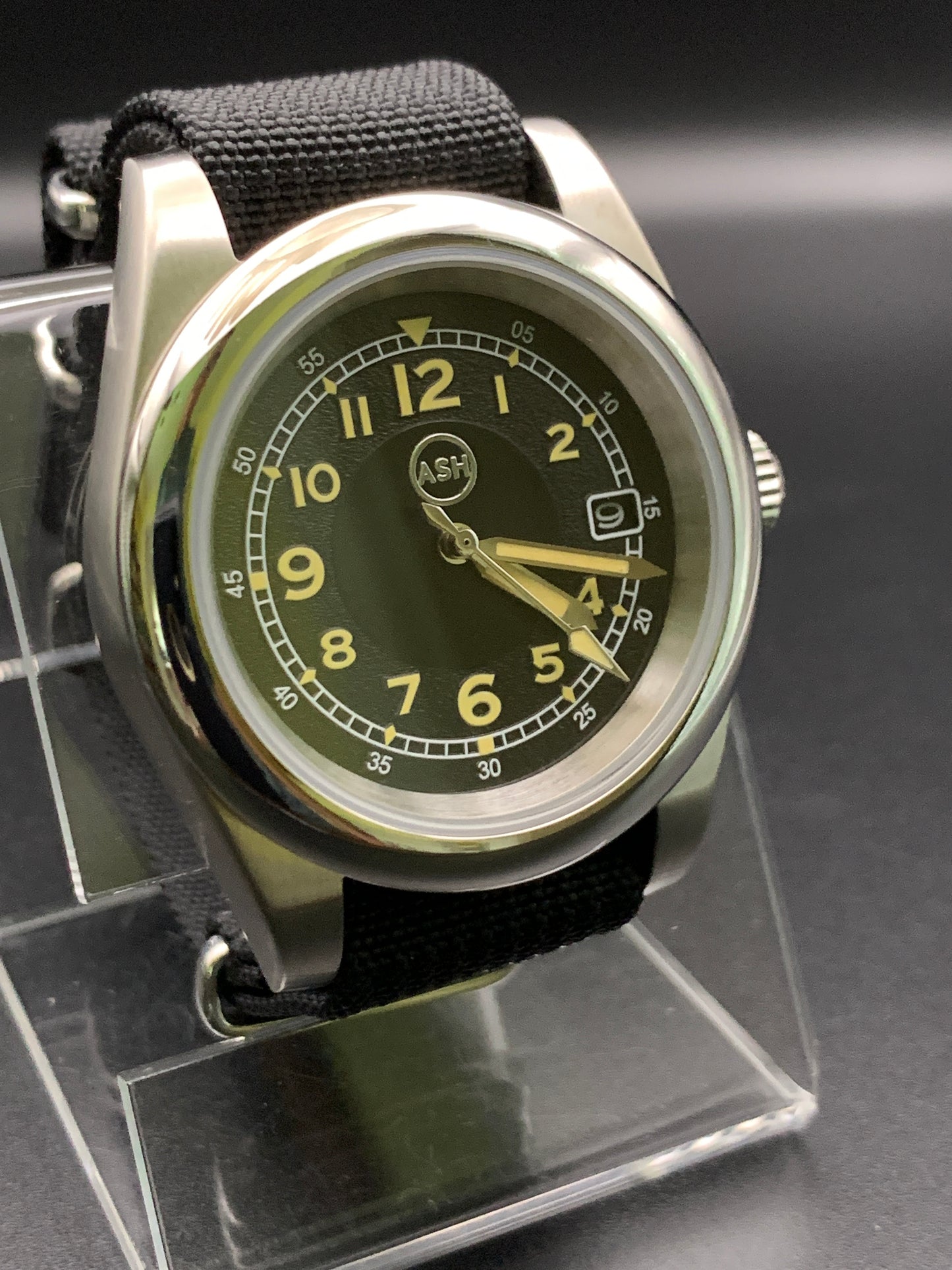 Black and yellow 39mm field watch.