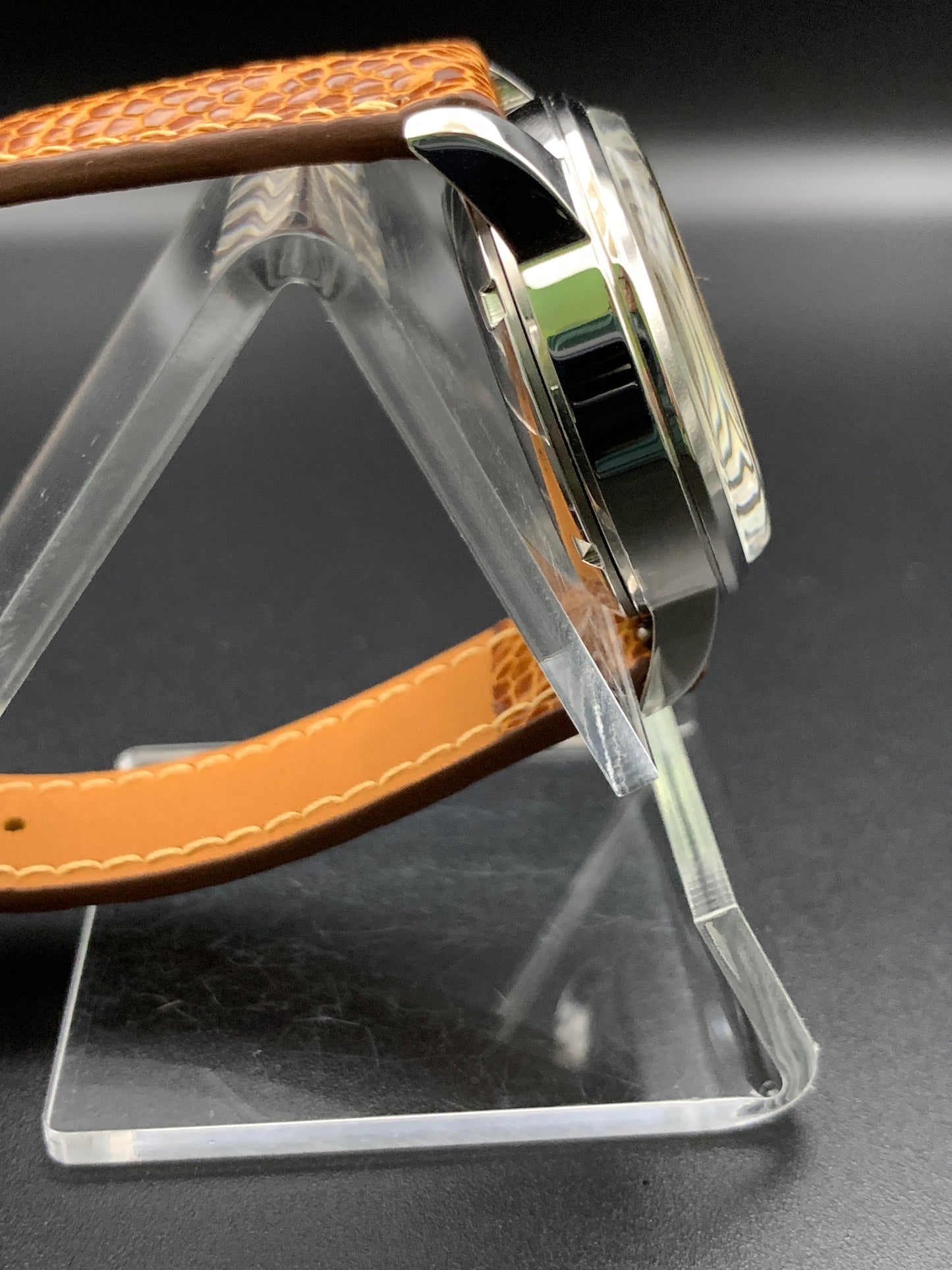 33mm Golden mother of pearl dress watch. Ostrich leather strap.