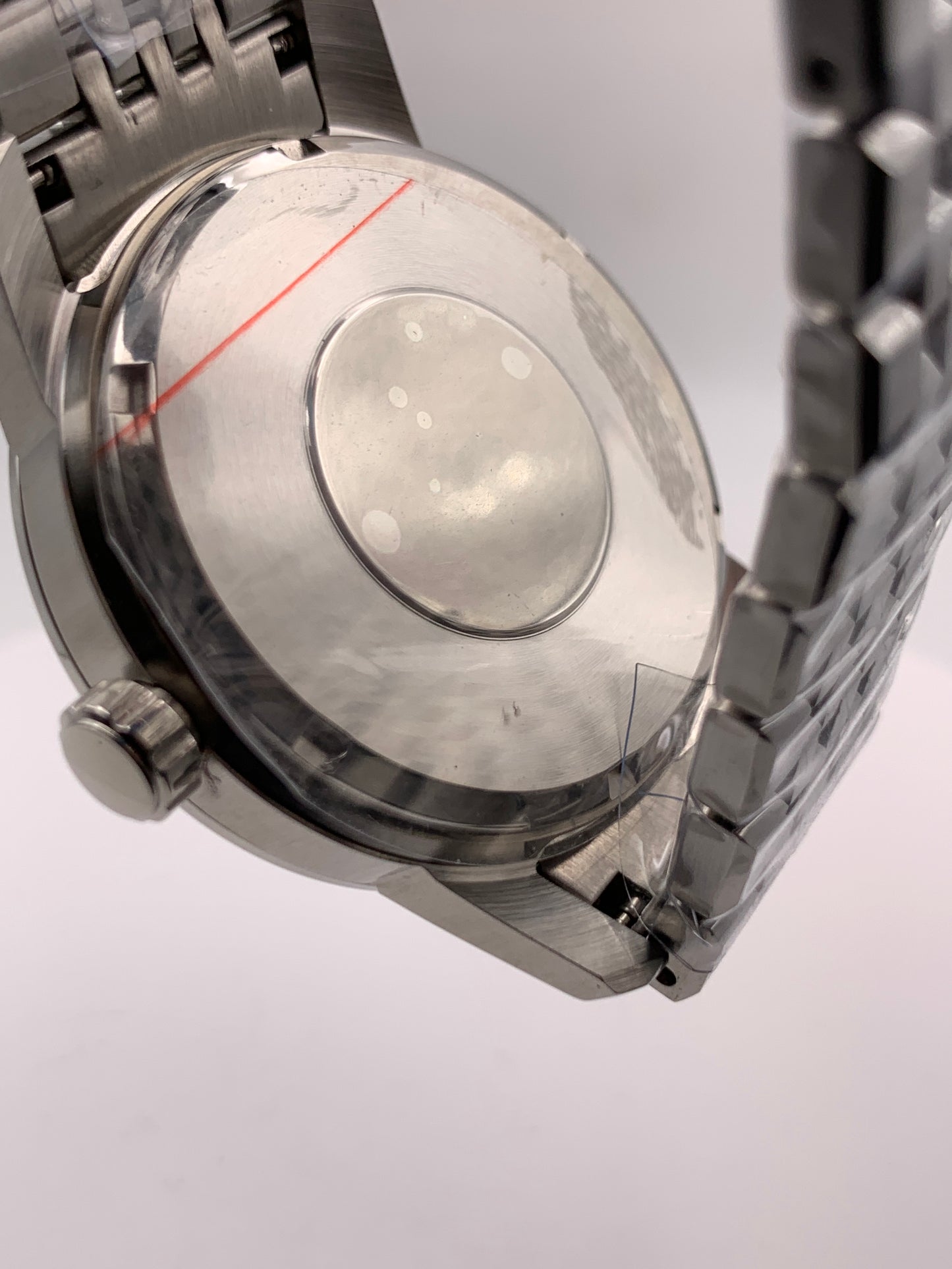 Nocturne. 40mm stainless steel case with matching bracelet. Box sapphire crystal. Seiko NH35