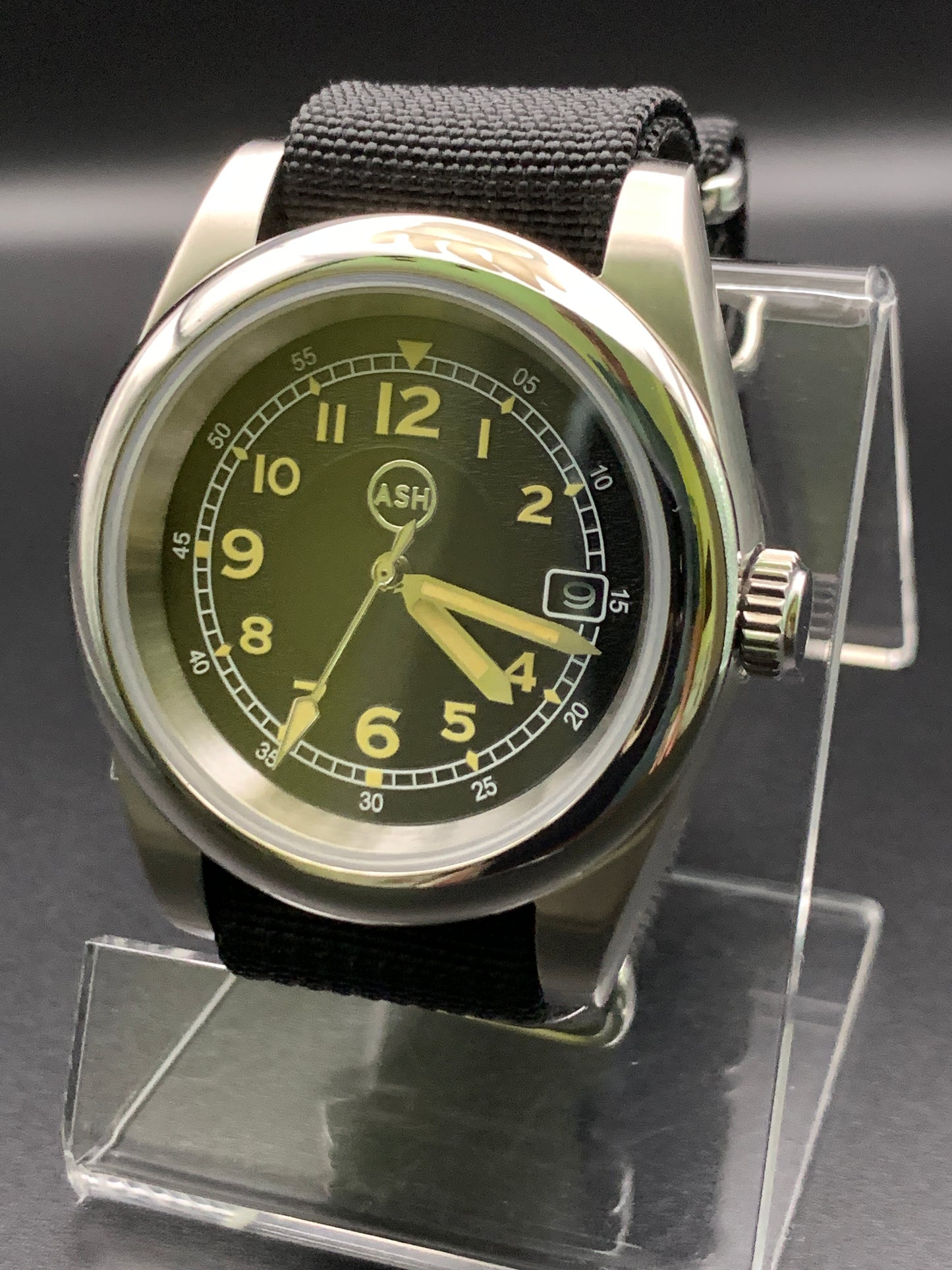 Black and yellow 39mm field watch.