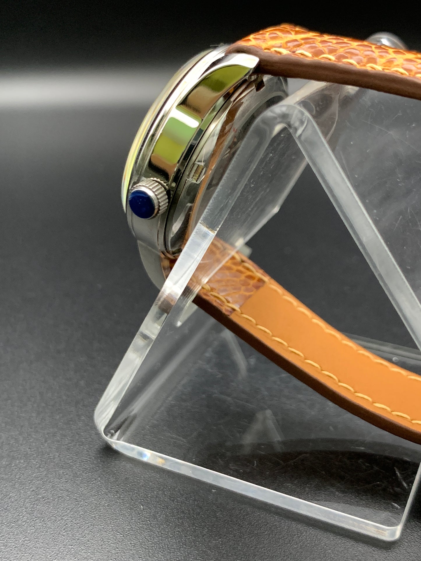 33mm Golden mother of pearl dress watch. Ostrich leather strap.