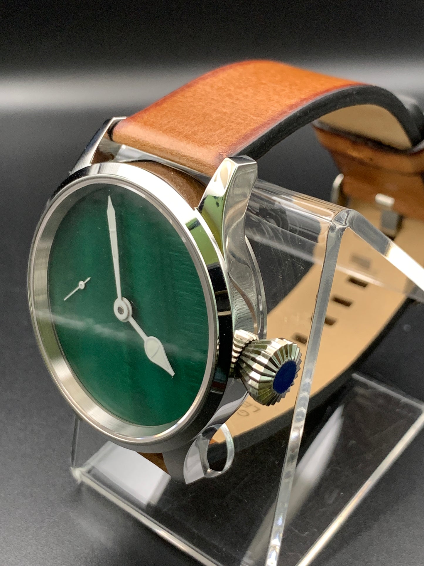 42mm Dark green mother of pearl. Swiss movement.