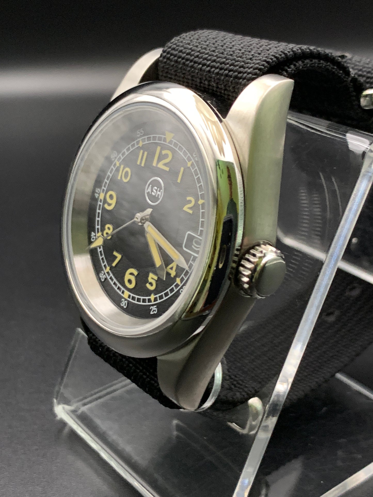 Black and yellow 39mm field watch.
