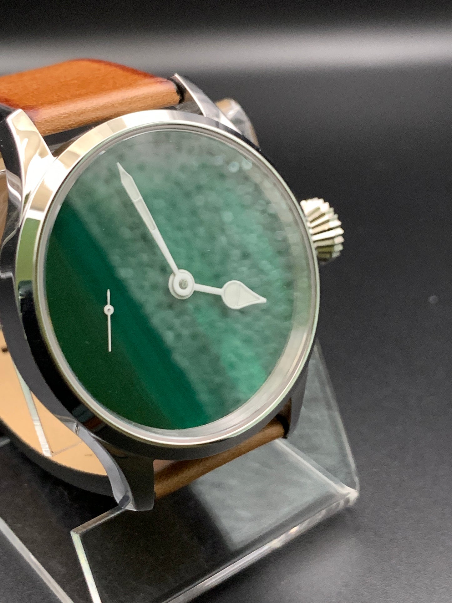 42mm Dark green mother of pearl. Swiss movement.