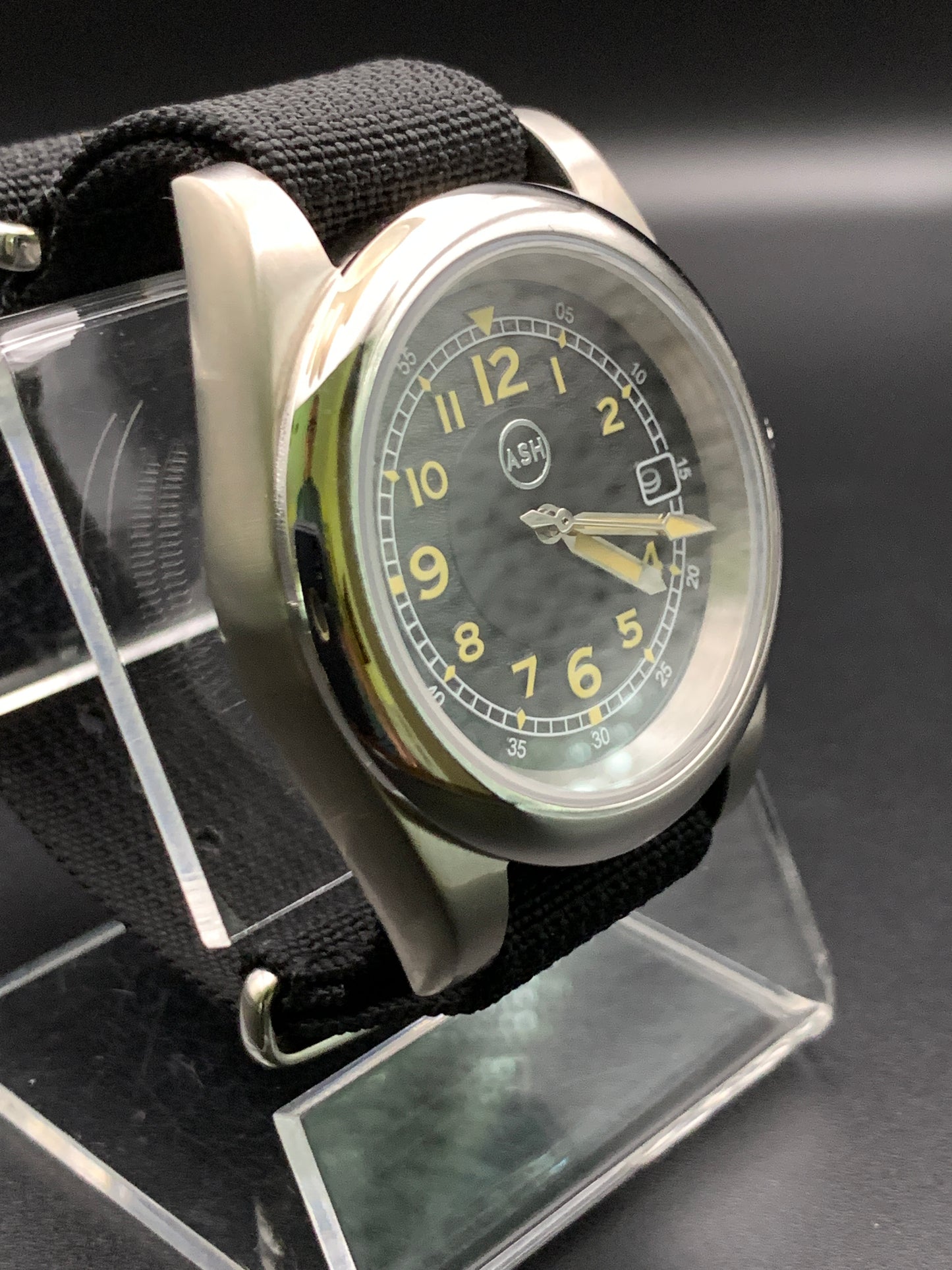 Black and yellow 39mm field watch.