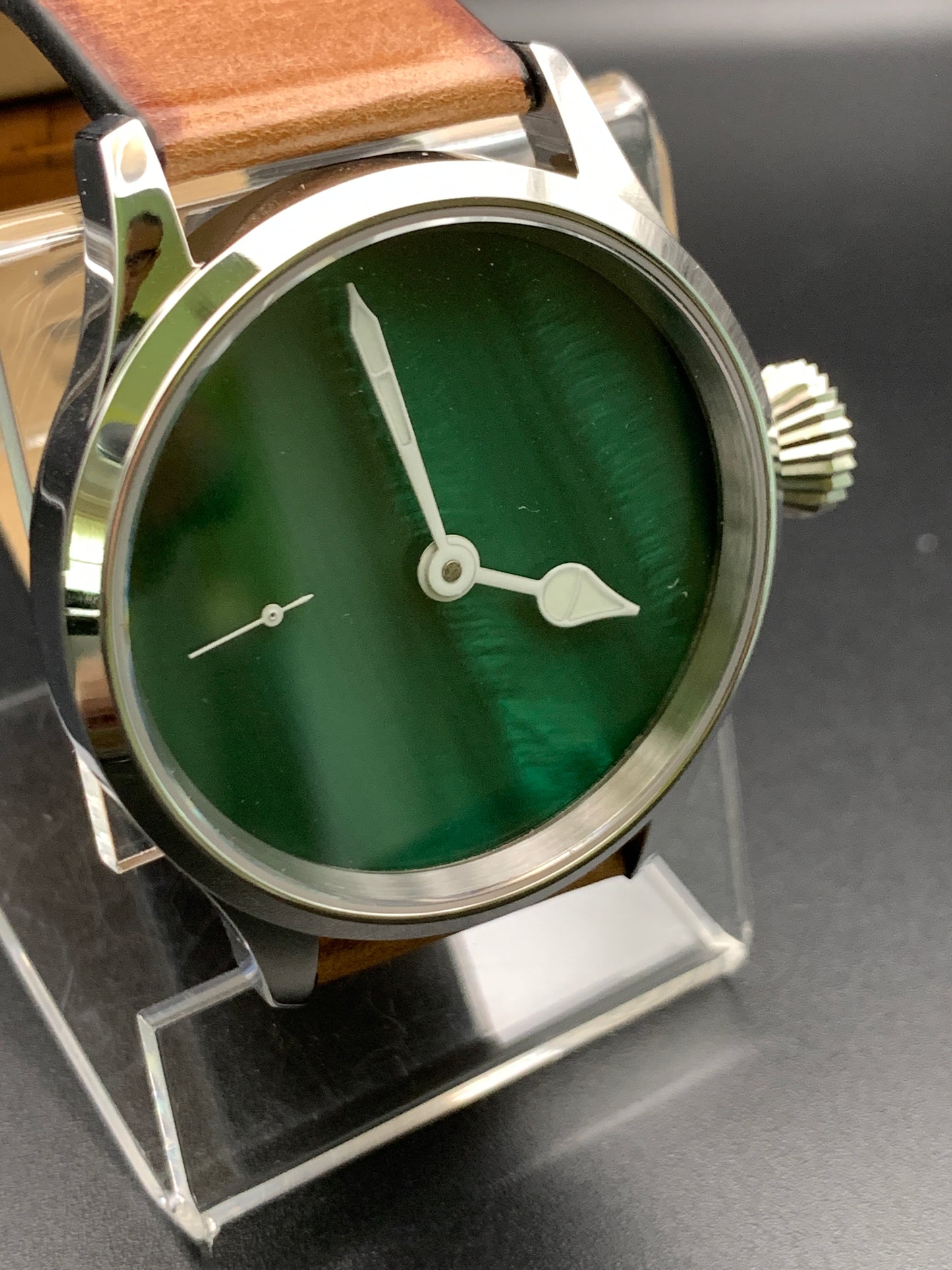 42mm Dark green mother of pearl. Swiss movement.