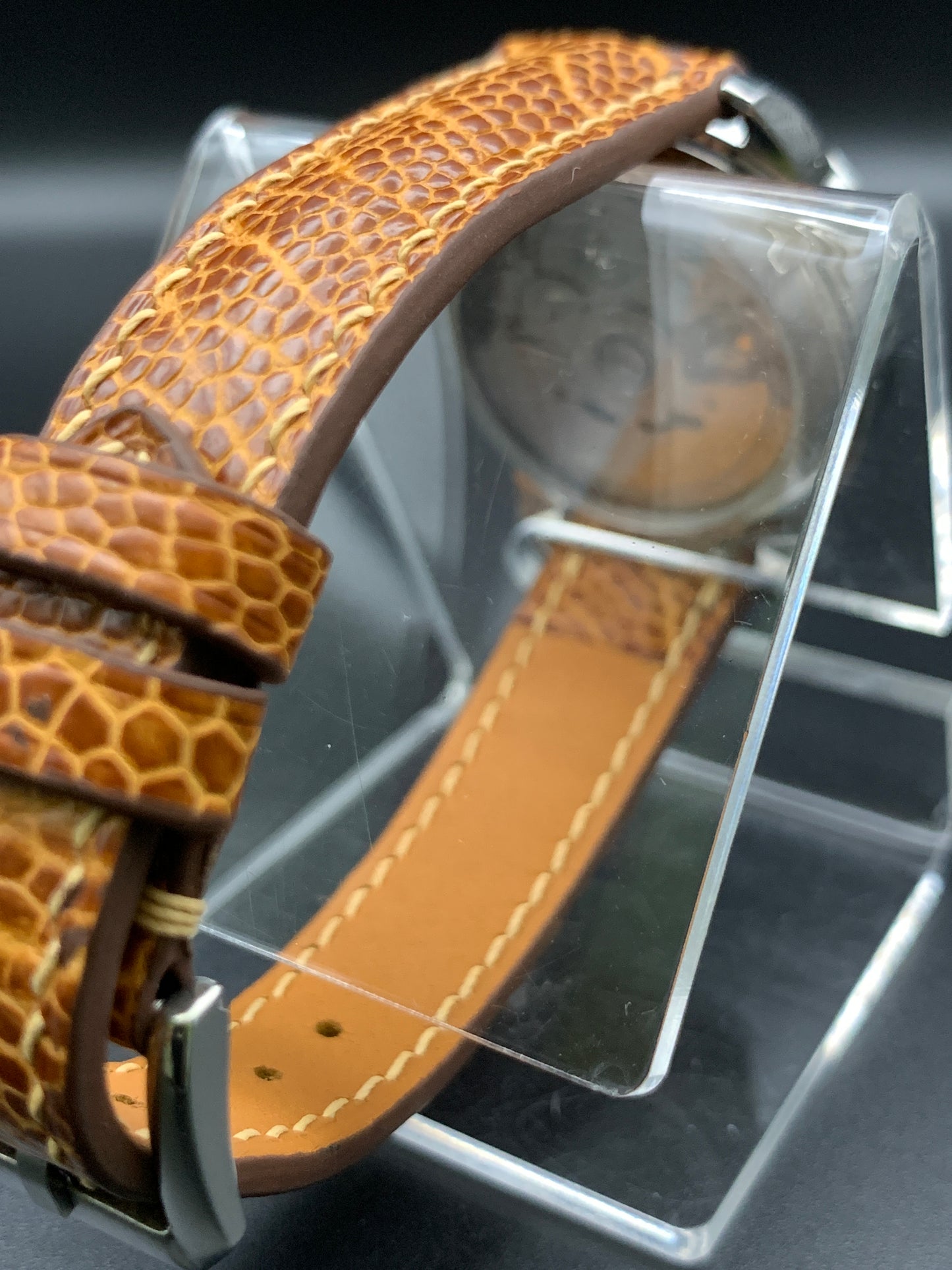 33mm Golden mother of pearl dress watch. Ostrich leather strap.