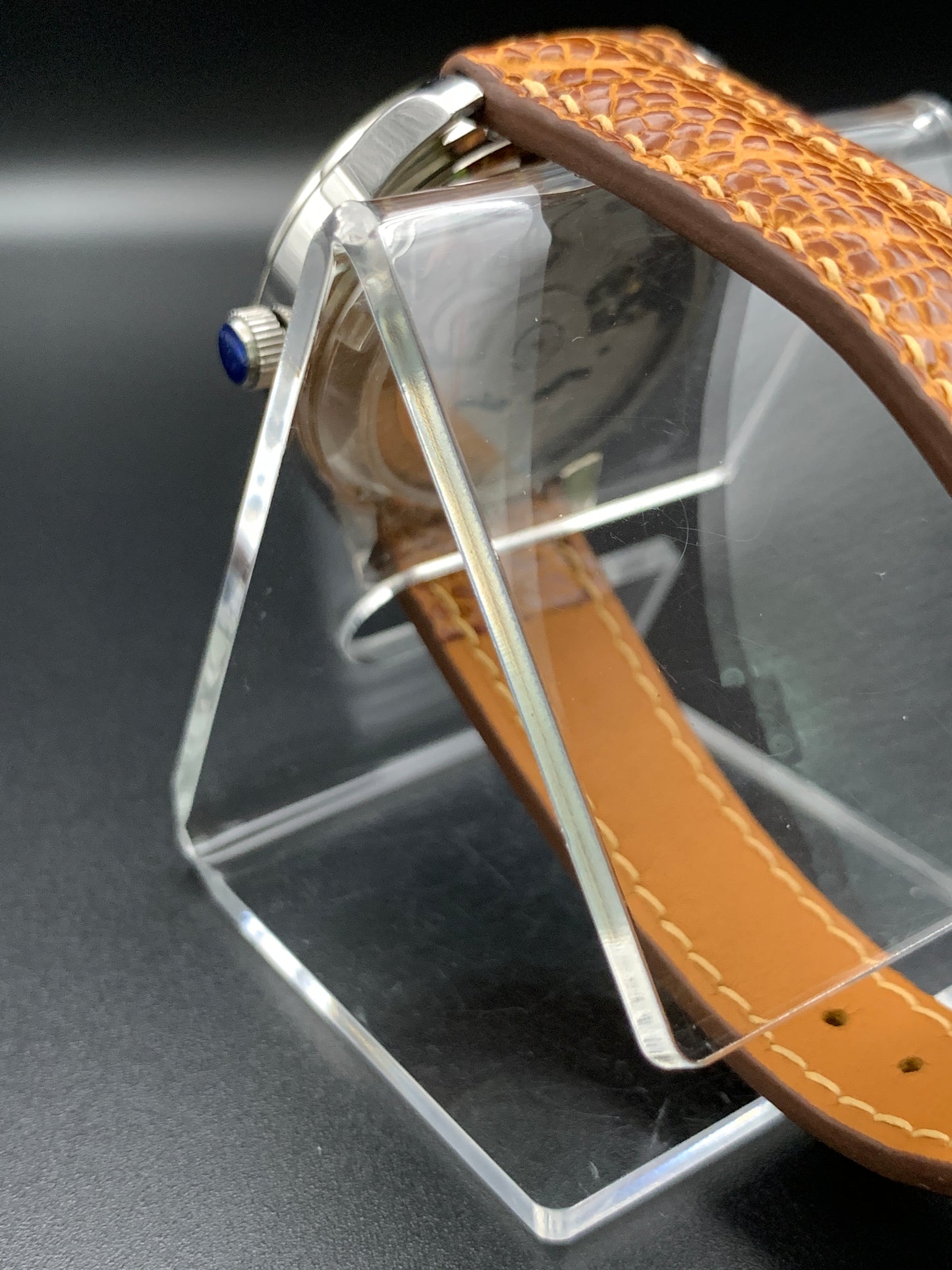 33mm Golden mother of pearl dress watch. Ostrich leather strap.