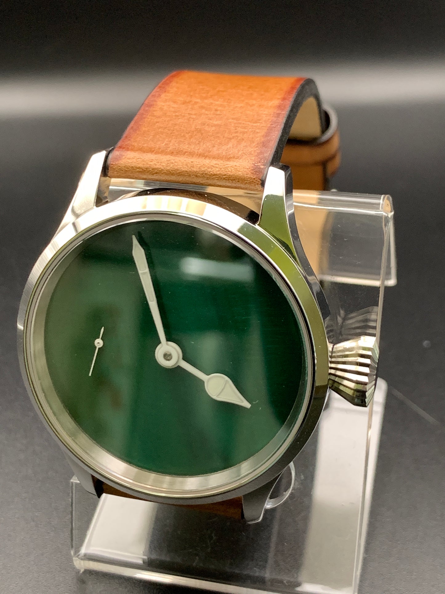 42mm Dark green mother of pearl. Swiss movement.
