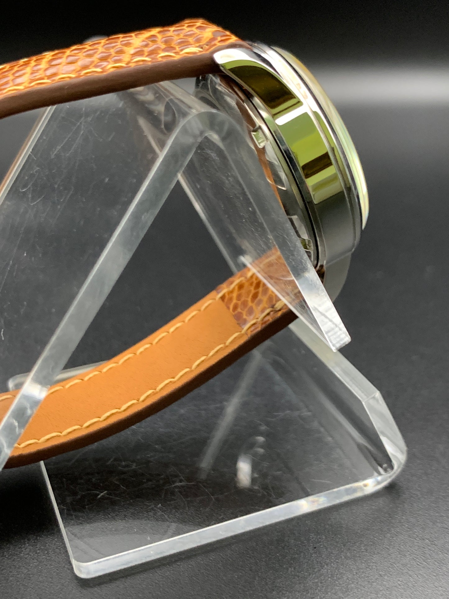 33mm Golden mother of pearl dress watch. Ostrich leather strap.