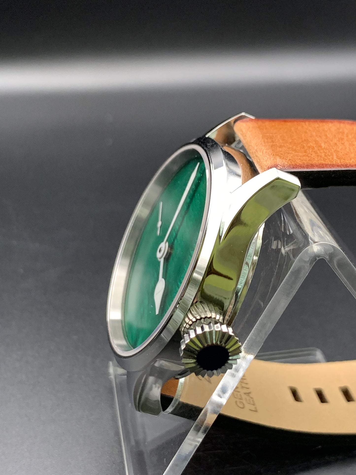 42mm Dark green mother of pearl. Swiss movement.