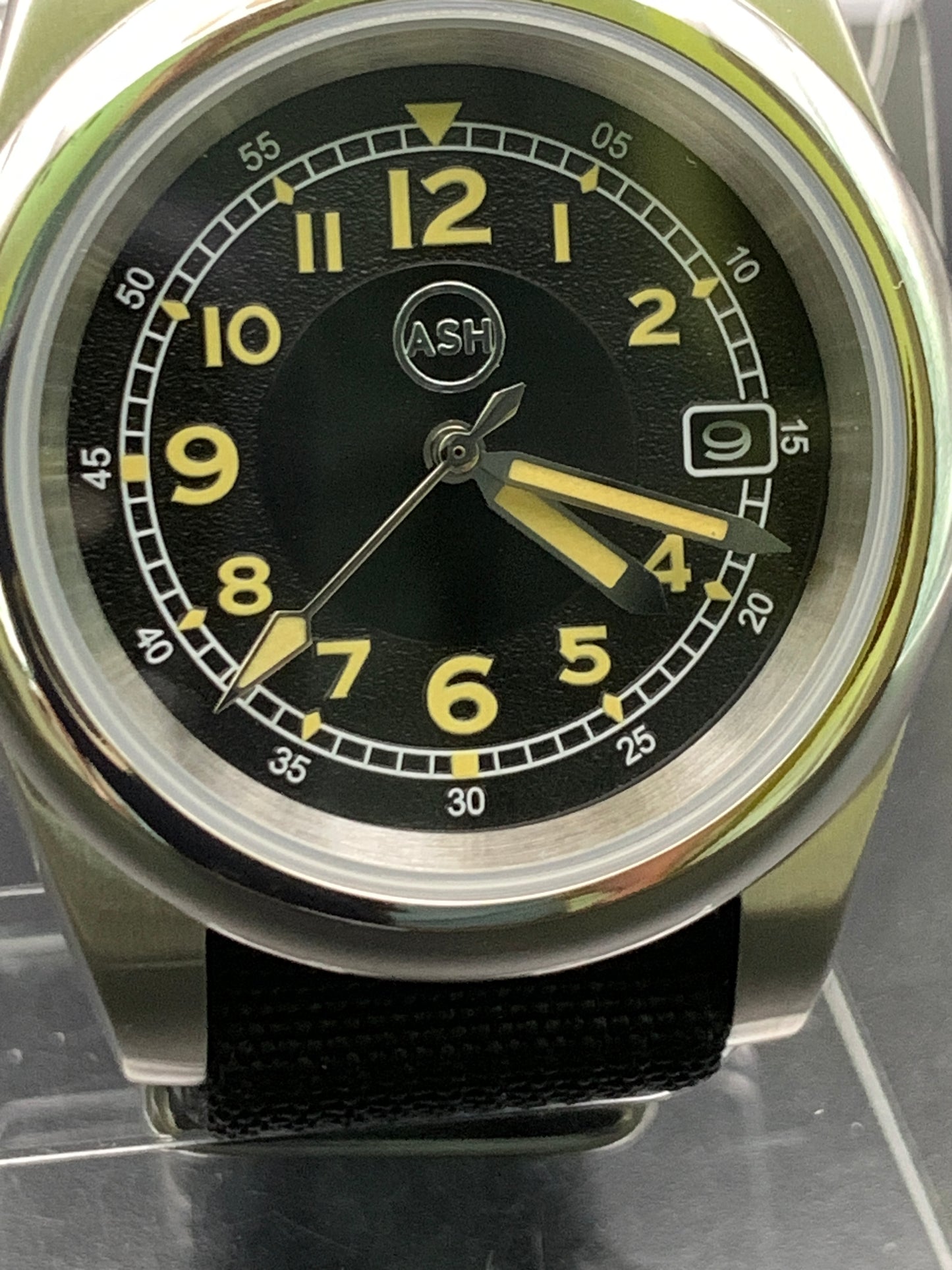 Black and yellow 39mm field watch.