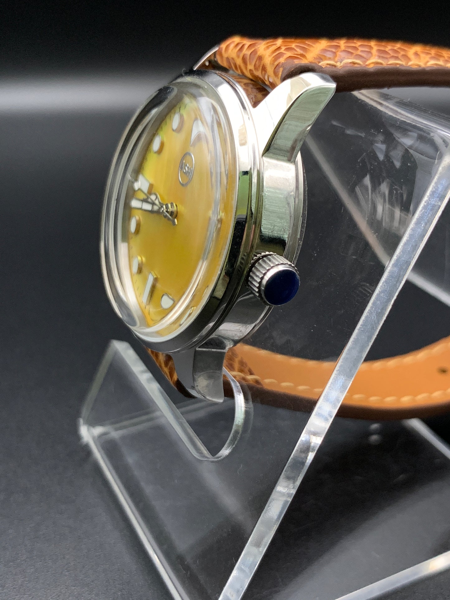33mm Golden mother of pearl dress watch. Ostrich leather strap.