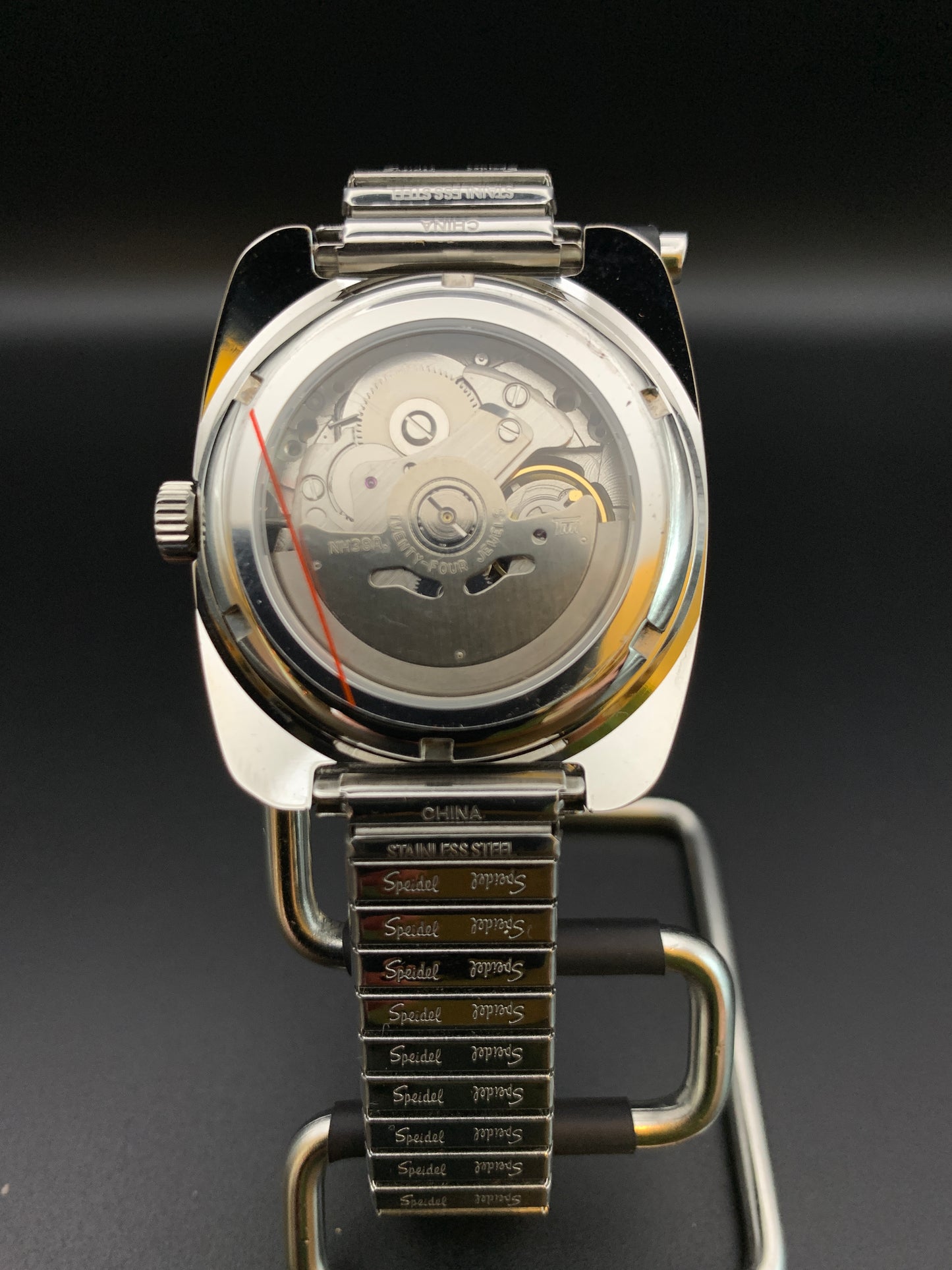 Vintage style faceted case wristwatch. Seiko NH38.