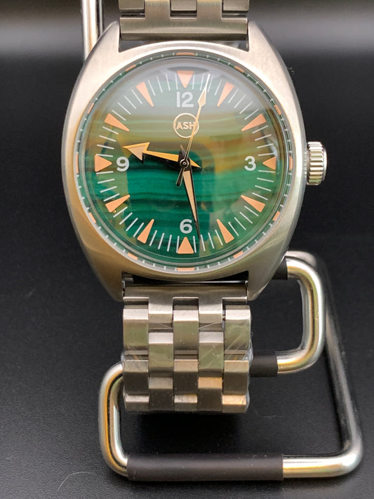 Alpha. 39mm stainless steel case. Domed sapphire crystal. NH38 automatic.