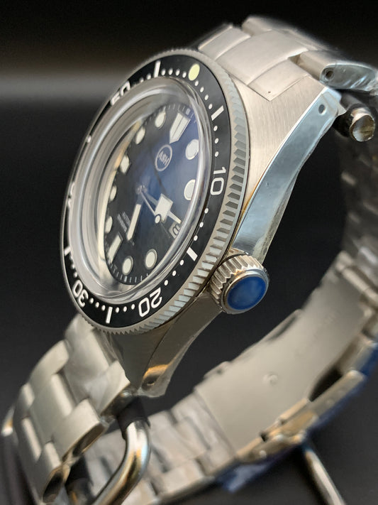 62More. 40mm stainless steel case and matching bracelet. Sapphire crystal. NH35 automatic.