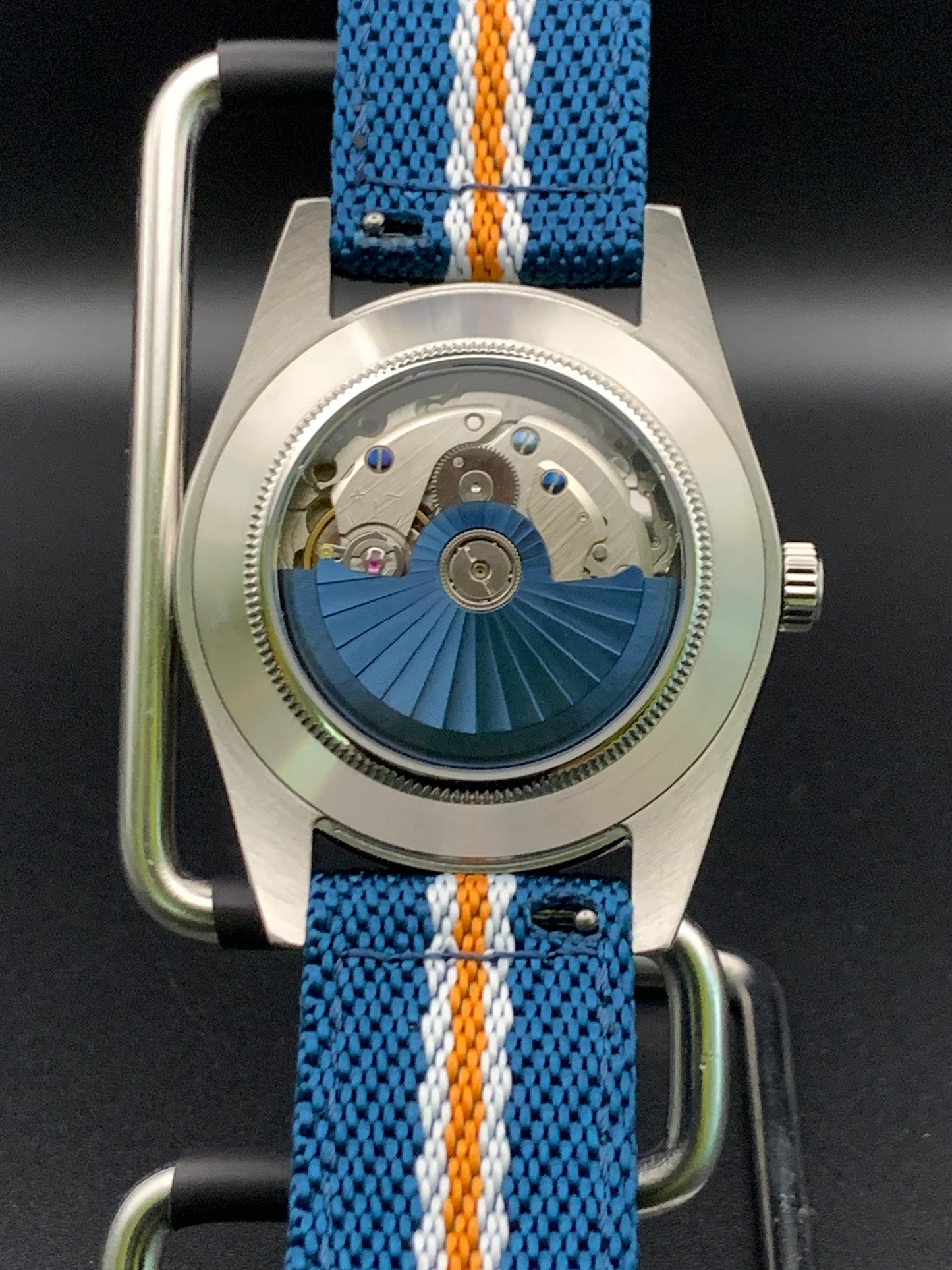 Orange, White, and Blue Themed Watch. Mets. Knicks, Oilers, Broncos.