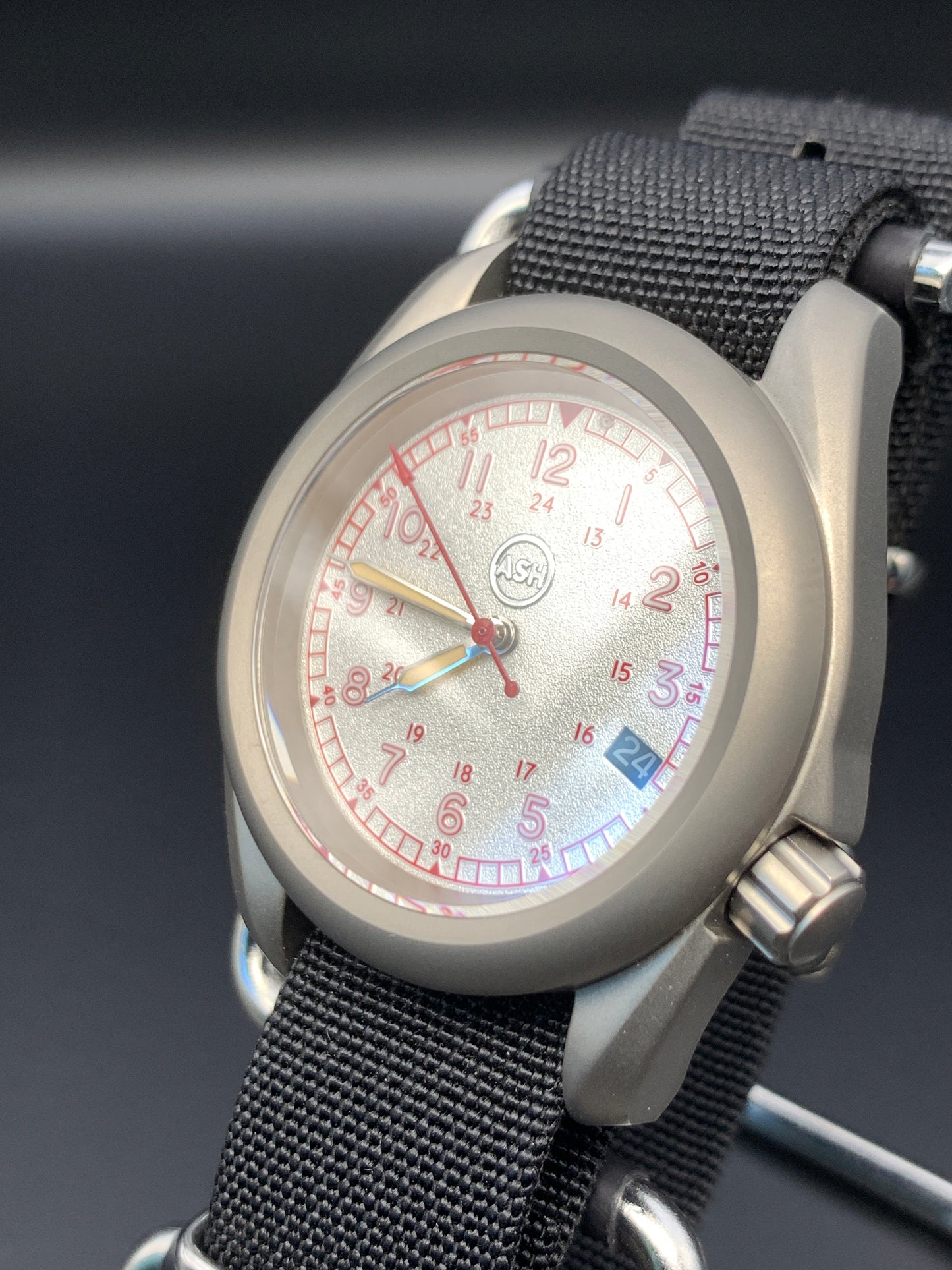 38mm Titanium Field Watch. Red and silver dial. Seiko NH35.