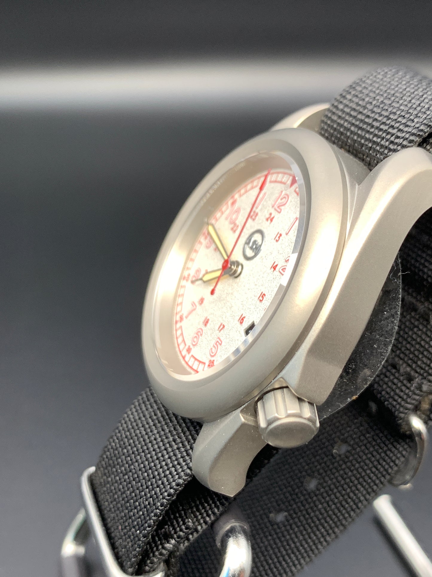 38mm Titanium Field Watch. Red and silver dial. Seiko NH35.