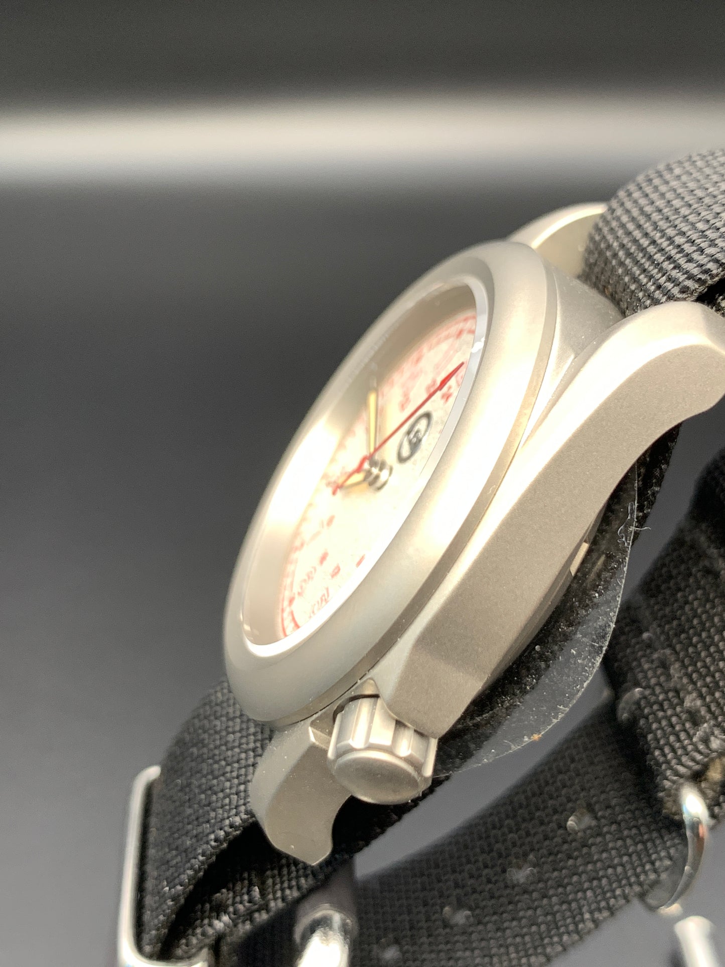 38mm Titanium Field Watch. Red and silver dial. Seiko NH35.