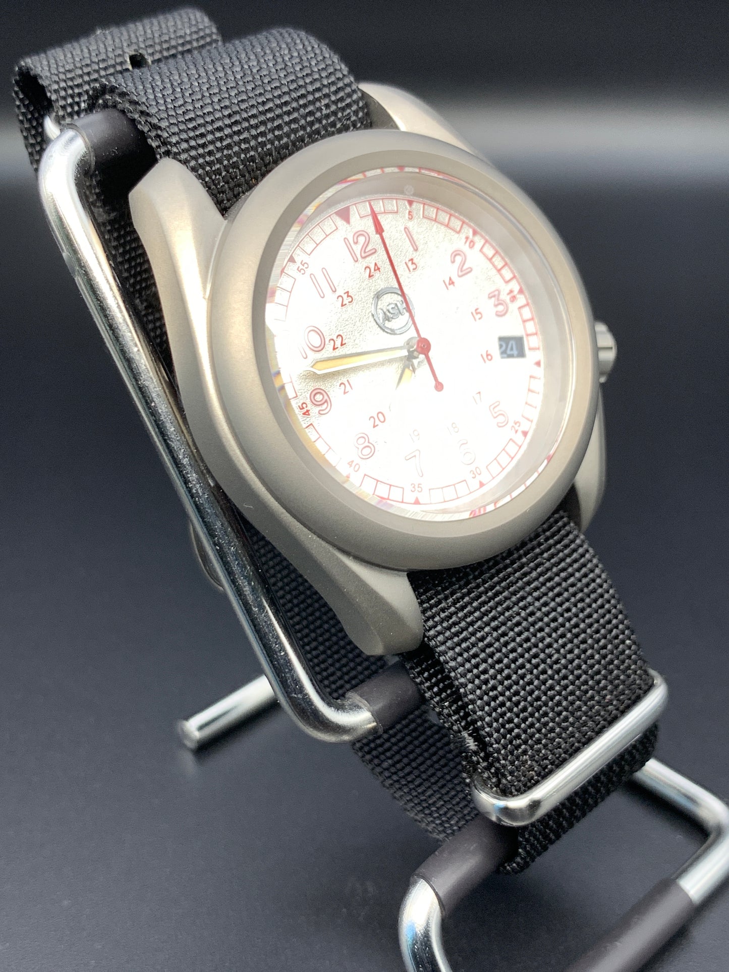 38mm Titanium Field Watch. Red and silver dial. Seiko NH35.