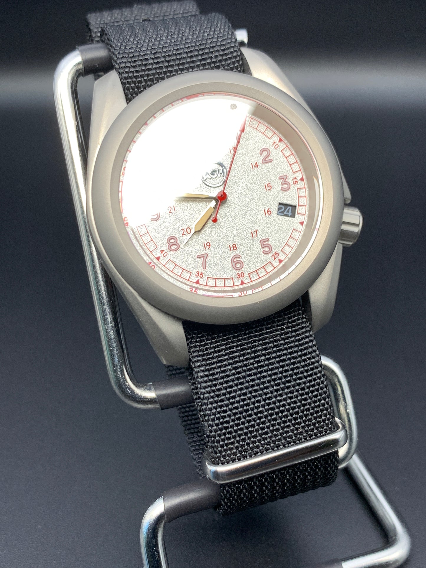38mm Titanium Field Watch. Red and silver dial. Seiko NH35.