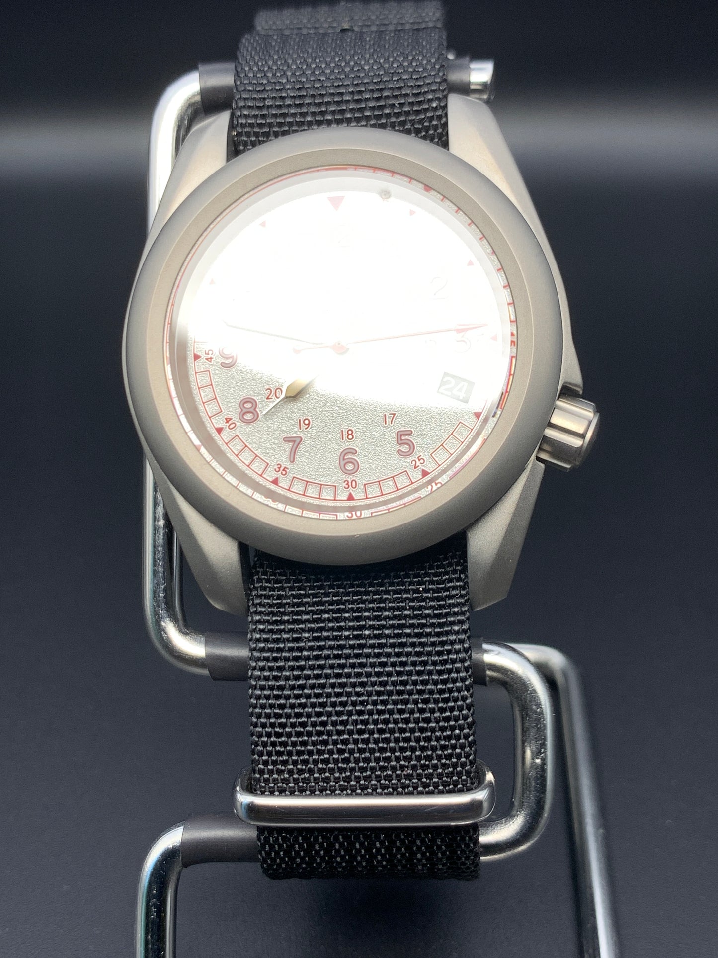 38mm Titanium Field Watch. Red and silver dial. Seiko NH35.