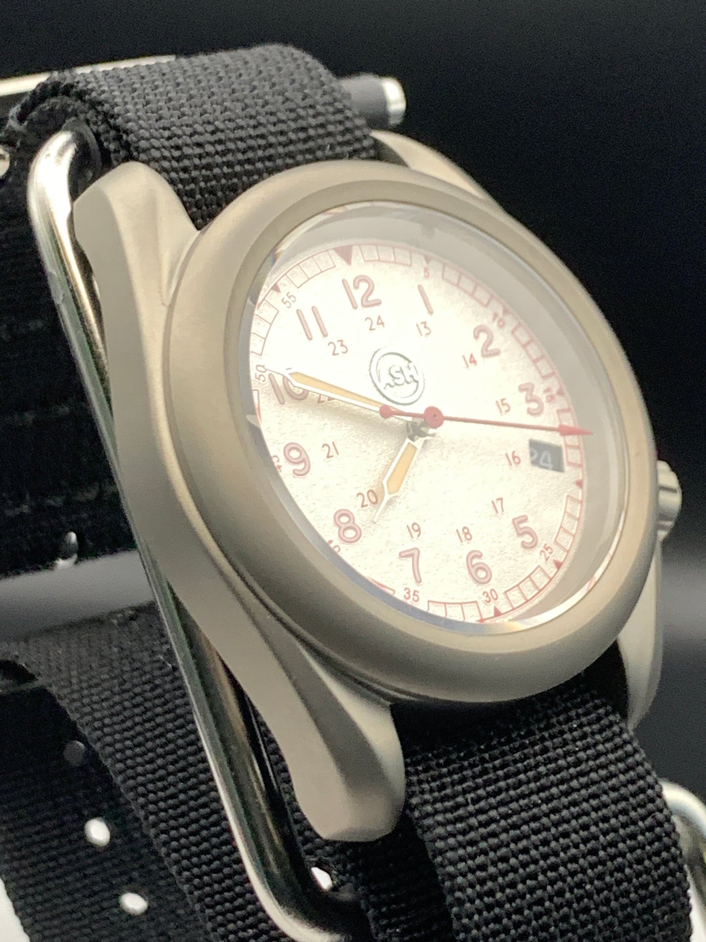 38mm Titanium Field Watch. Red and silver dial. Seiko NH35.
