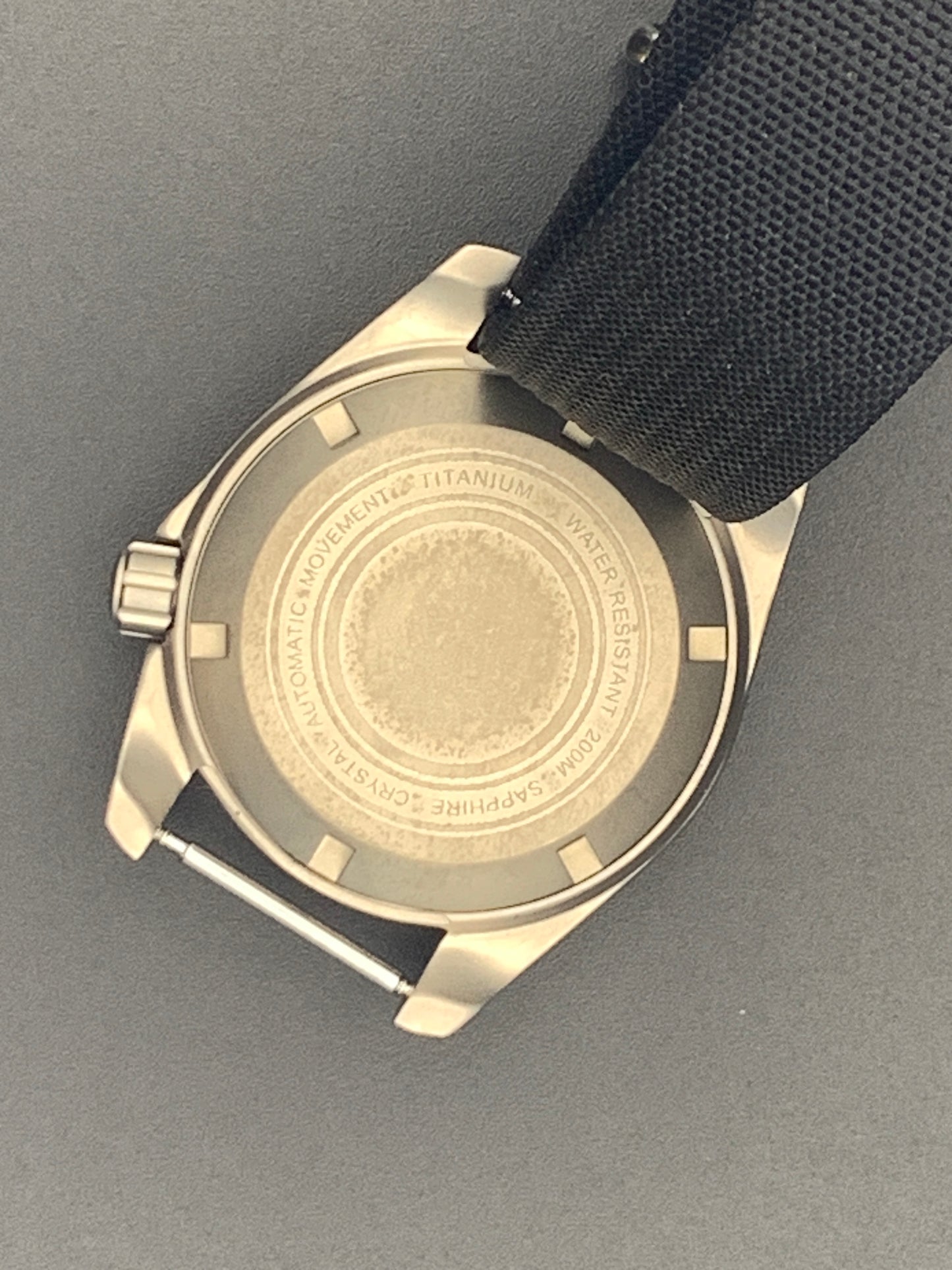 38mm Titanium Field Watch. Red and silver dial. Seiko NH35.