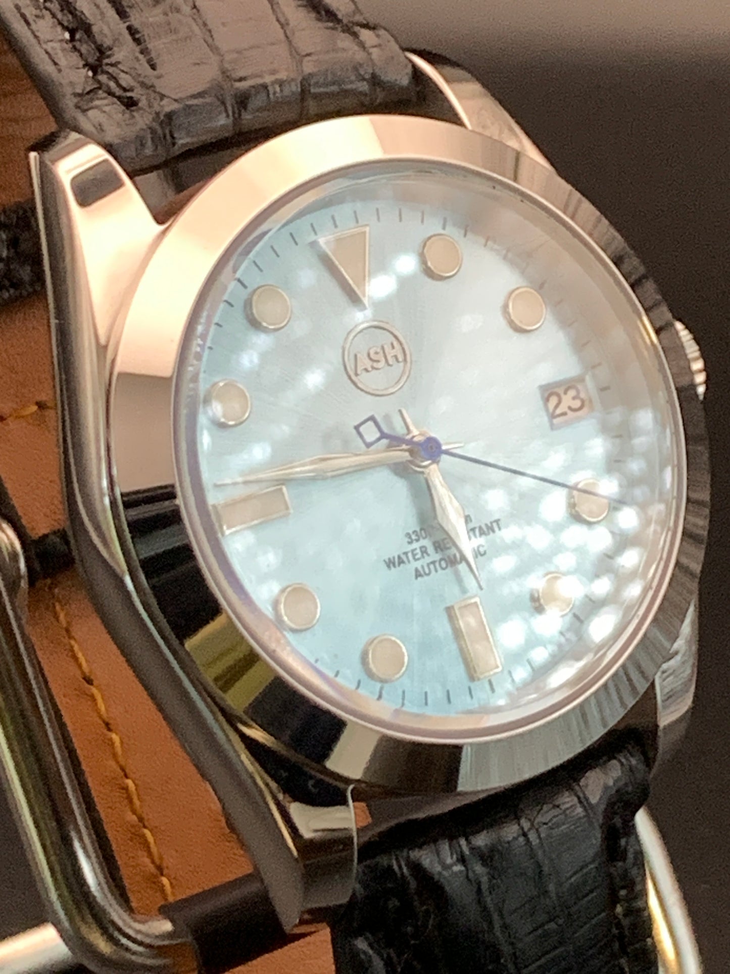 36mm Light blue sunray sport watch. Seiko NH35 Automatic.