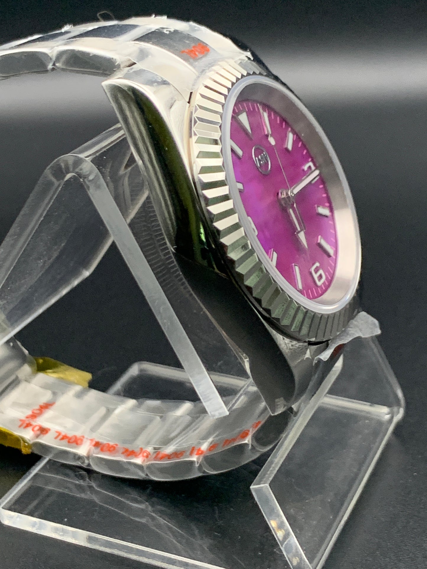 Fuchsia mother of pearl sport watch. Fluted bezel. Bracelet. Seiko NH38. Sapphire crystal.