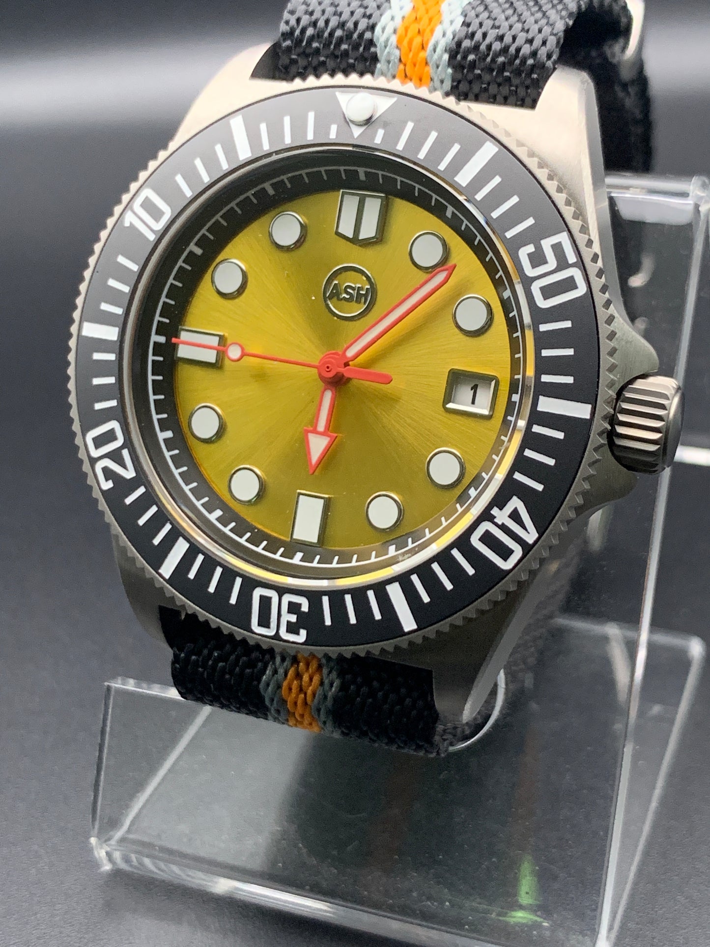 Titanium 42mm dive watch. Fixed lugs. Sapphire crystal. Seiko NH35. 200m water resistance.