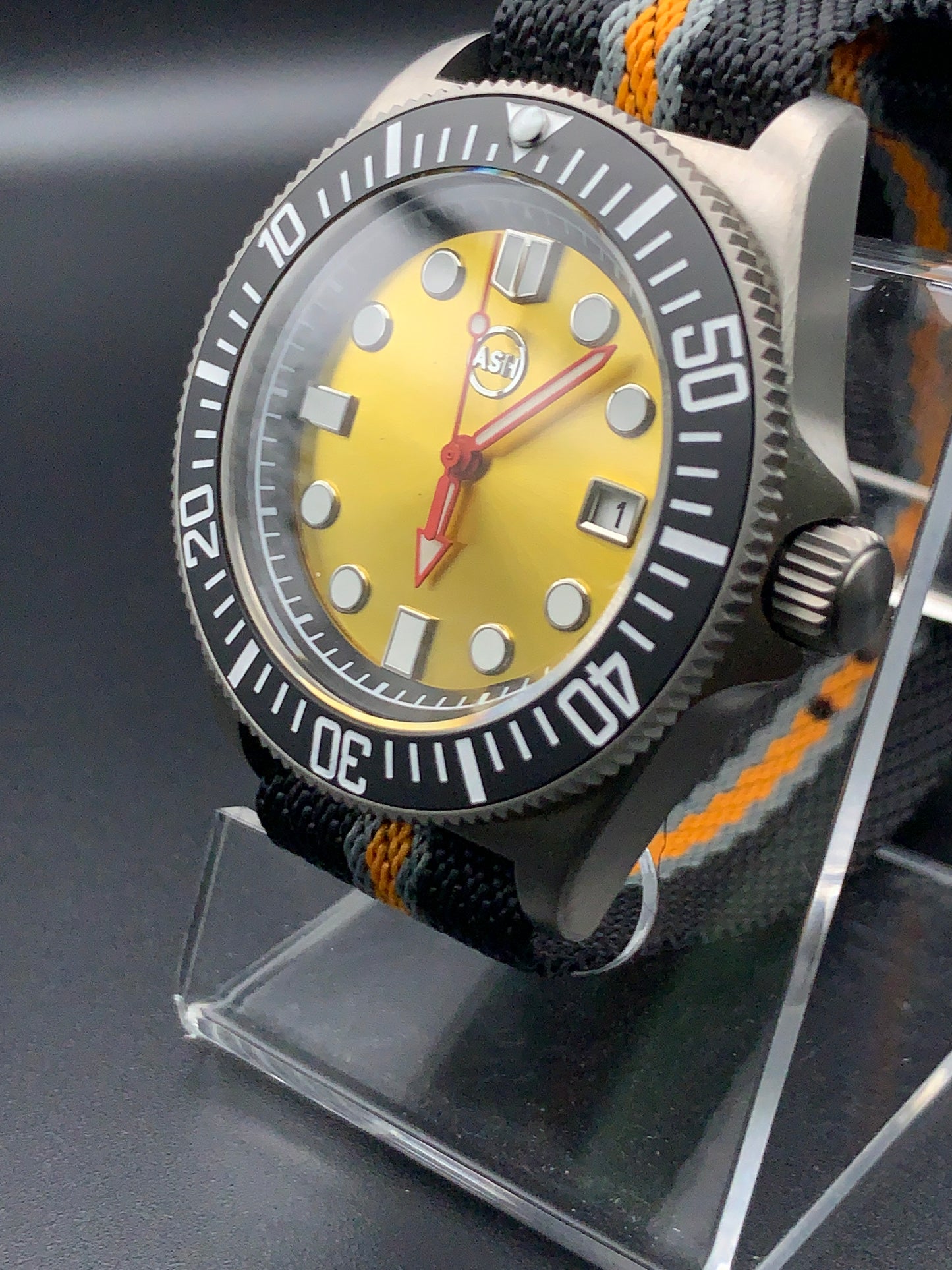 Titanium 42mm dive watch. Fixed lugs. Sapphire crystal. Seiko NH35. 200m water resistance.