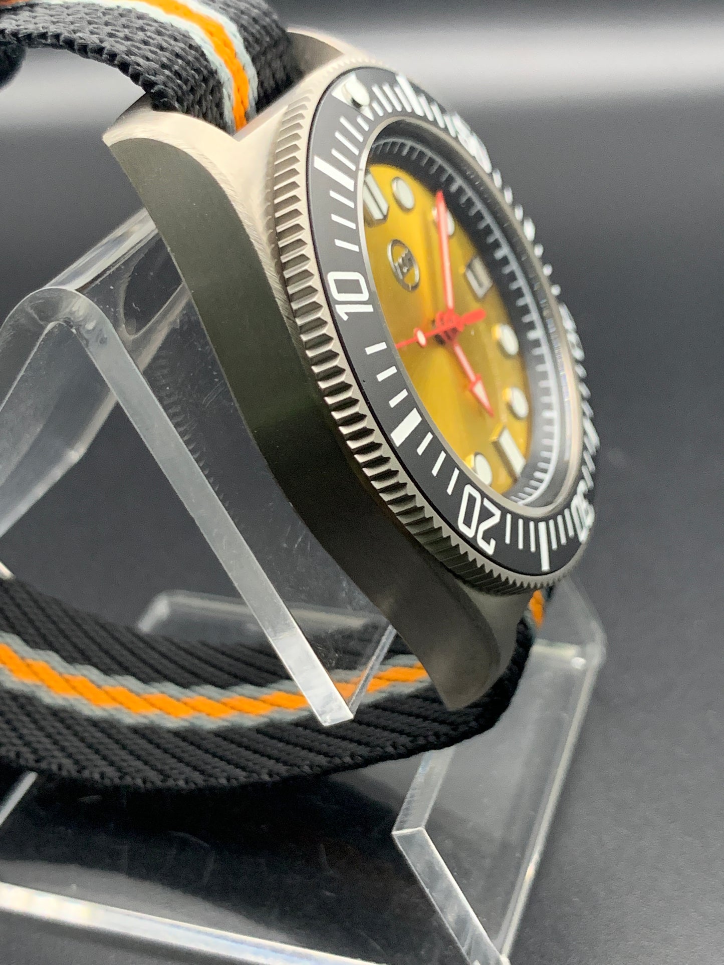 Titanium 42mm dive watch. Fixed lugs. Sapphire crystal. Seiko NH35. 200m water resistance.