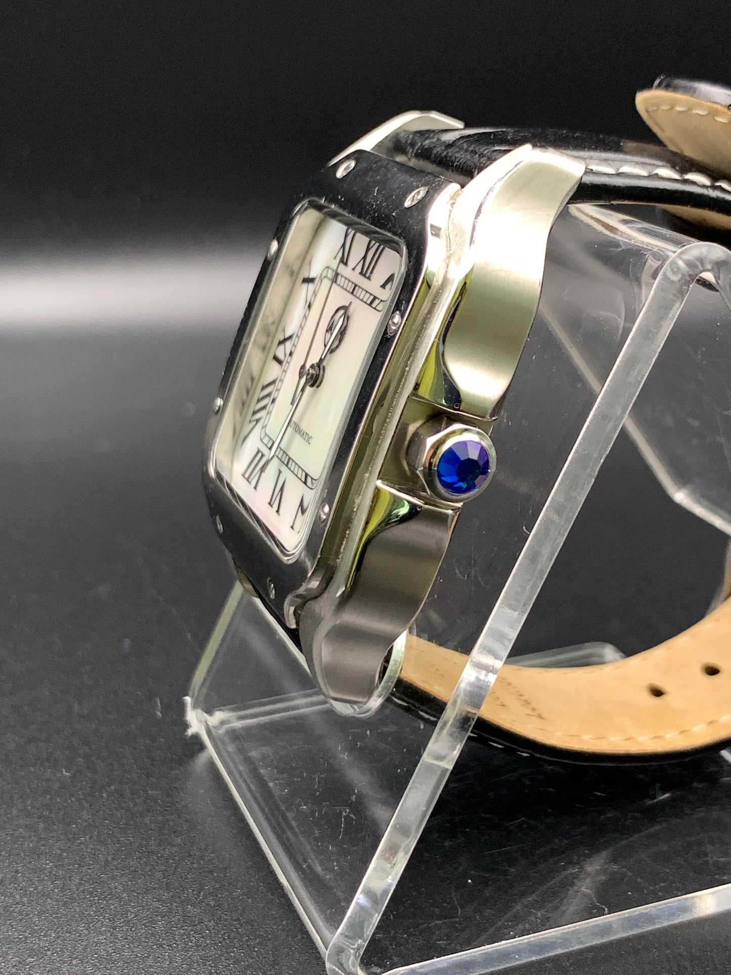 Santos styled 39mm rectangular dress watch. Mother of Pearl dial.