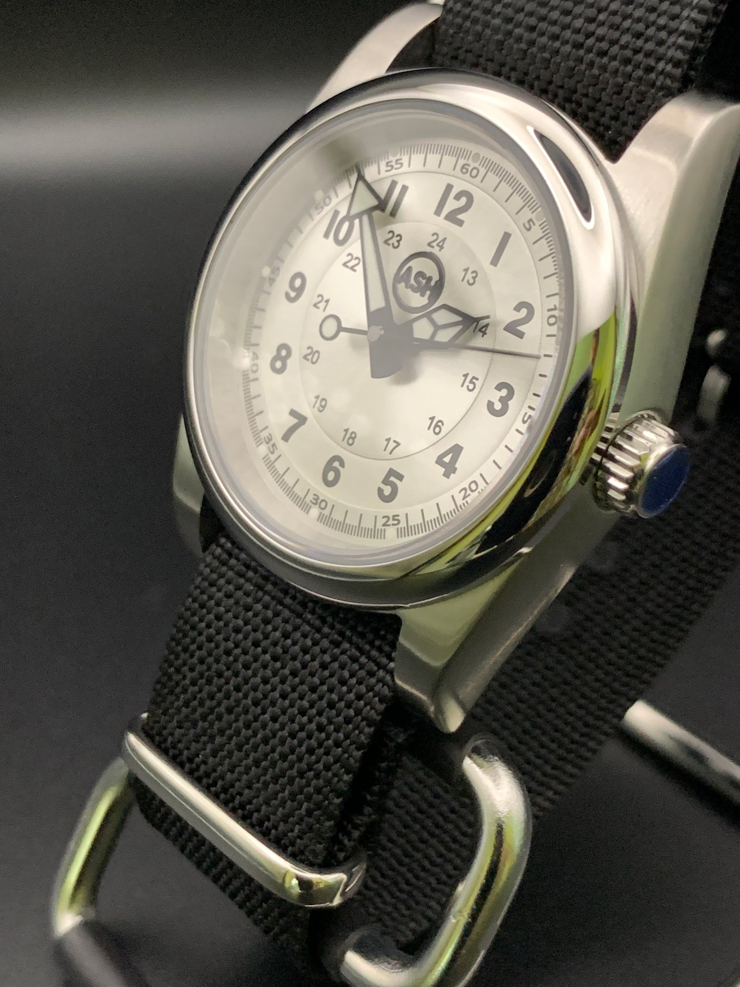 Silver sunray and black field watch. 36mm. Sapphire crystal. Seiko NH38.