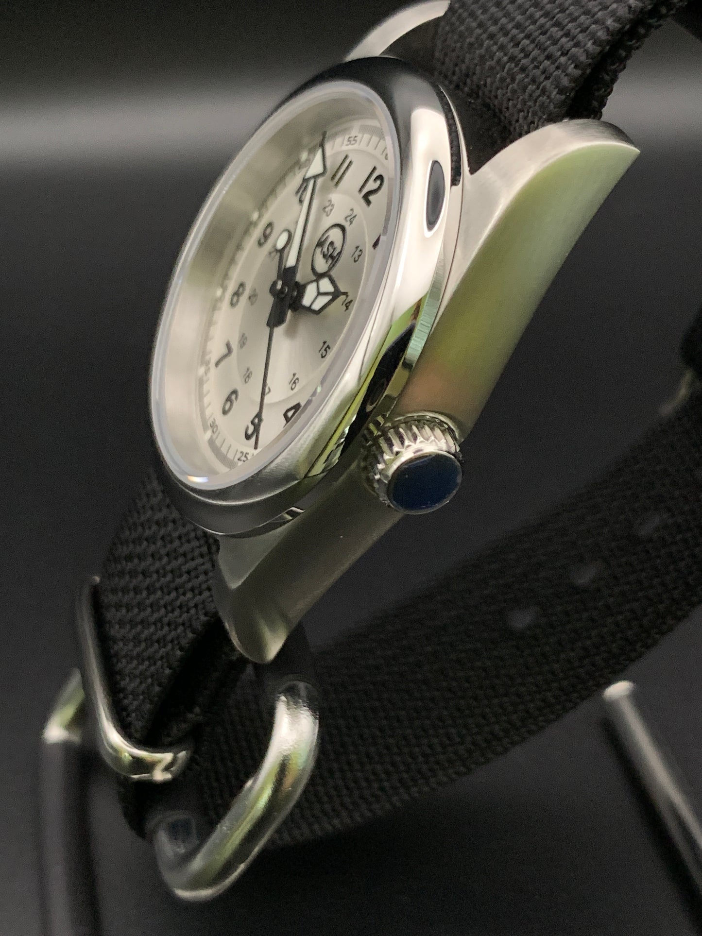 Silver sunray and black field watch. 36mm. Sapphire crystal. Seiko NH38.