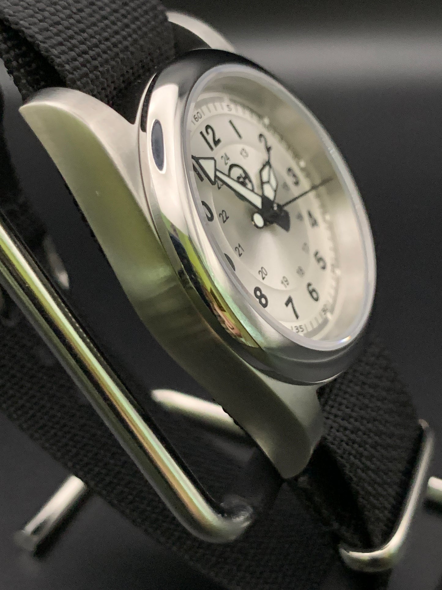 Silver sunray and black field watch. 36mm. Sapphire crystal. Seiko NH38.