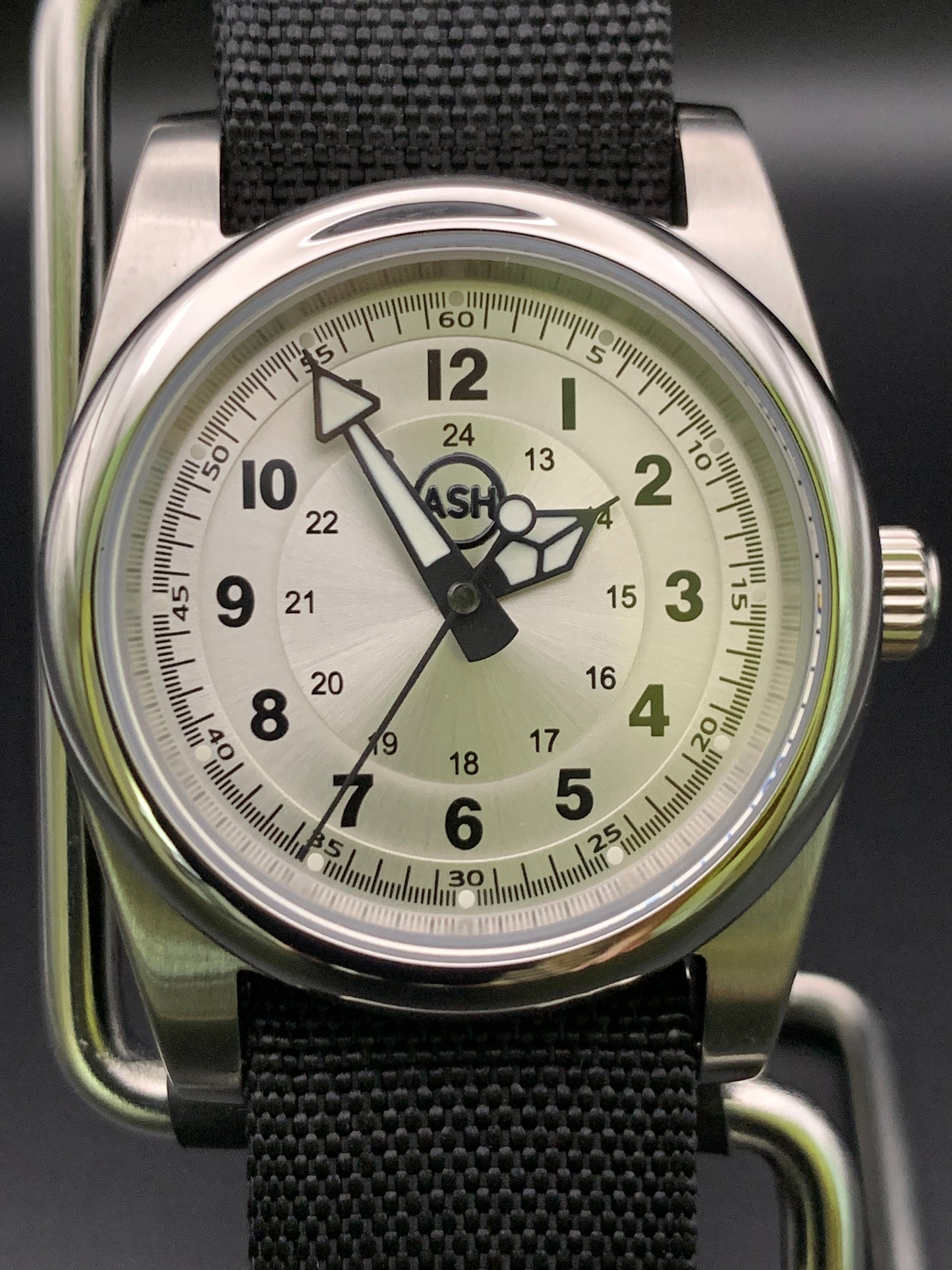 Silver sunray and black field watch. 36mm. Sapphire crystal. Seiko NH38.