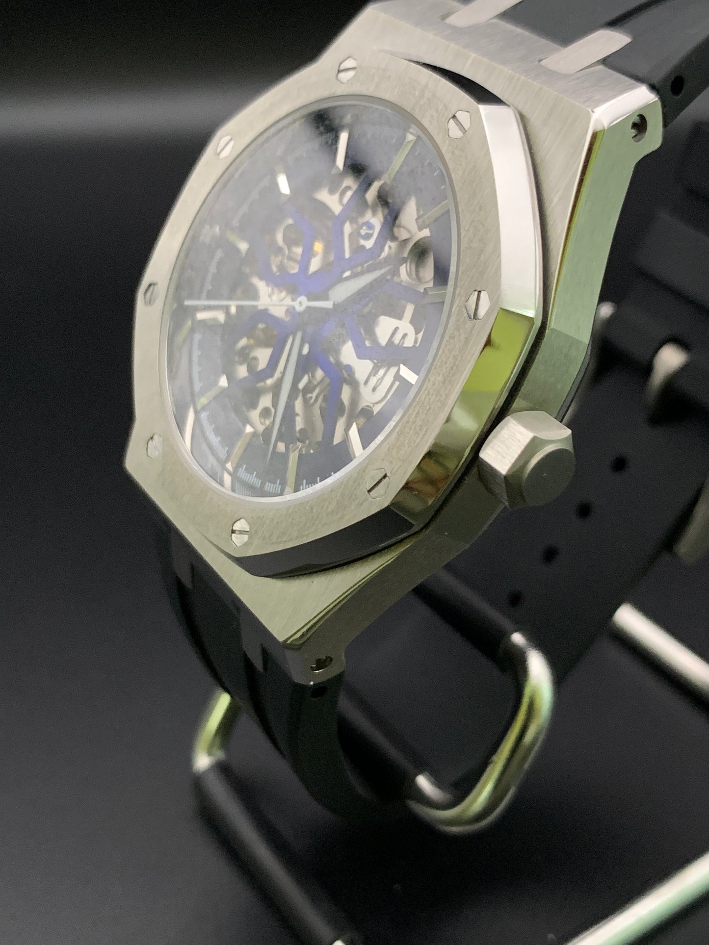 ‘Royal Oak’ style. Blueburst skeleton dial. Sapphire crystal. Seiko NH70. Bracelet and rubber strap included.