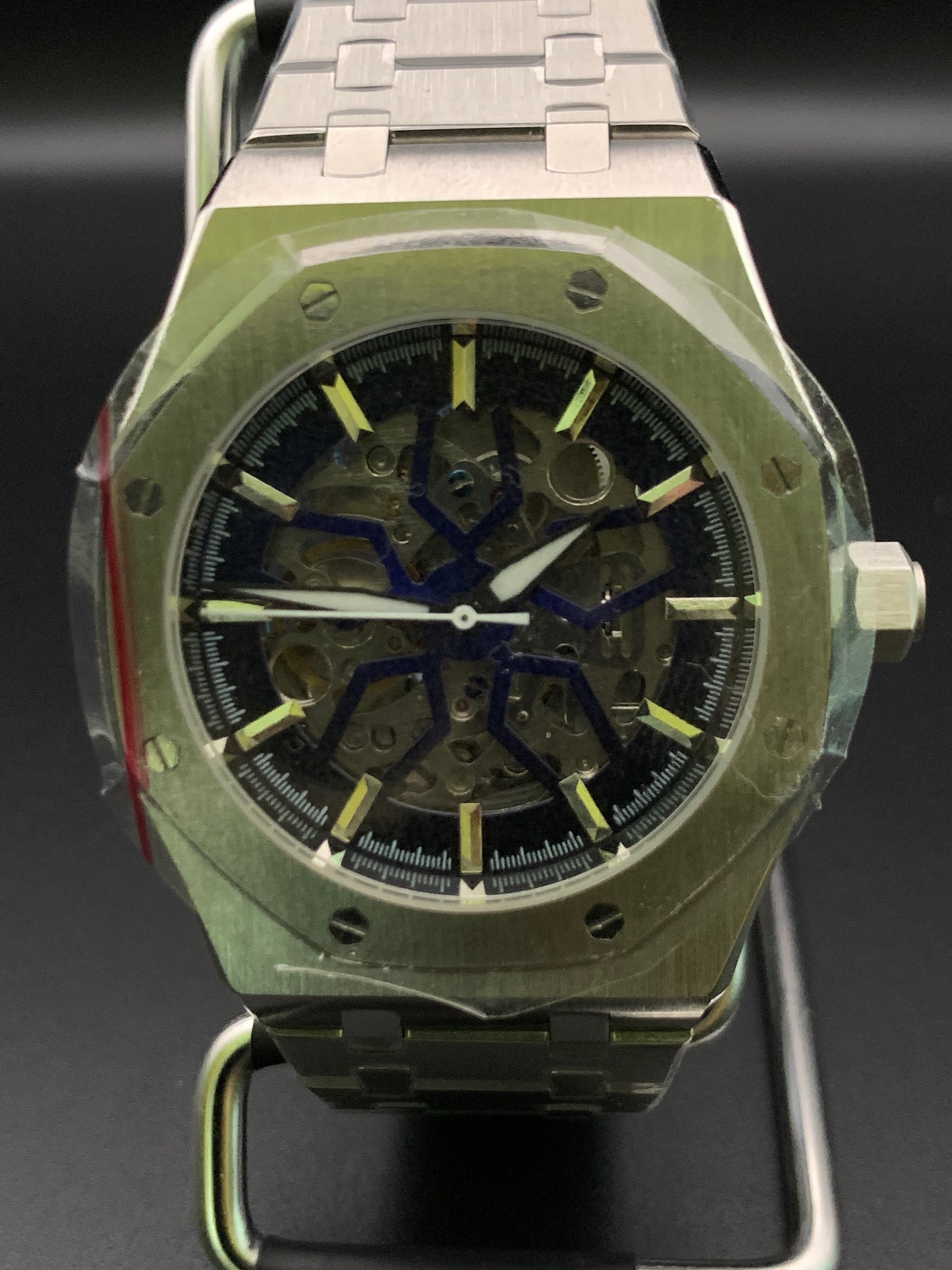 ‘Royal Oak’ style. Blueburst skeleton dial. Sapphire crystal. Seiko NH70. Bracelet and rubber strap included.