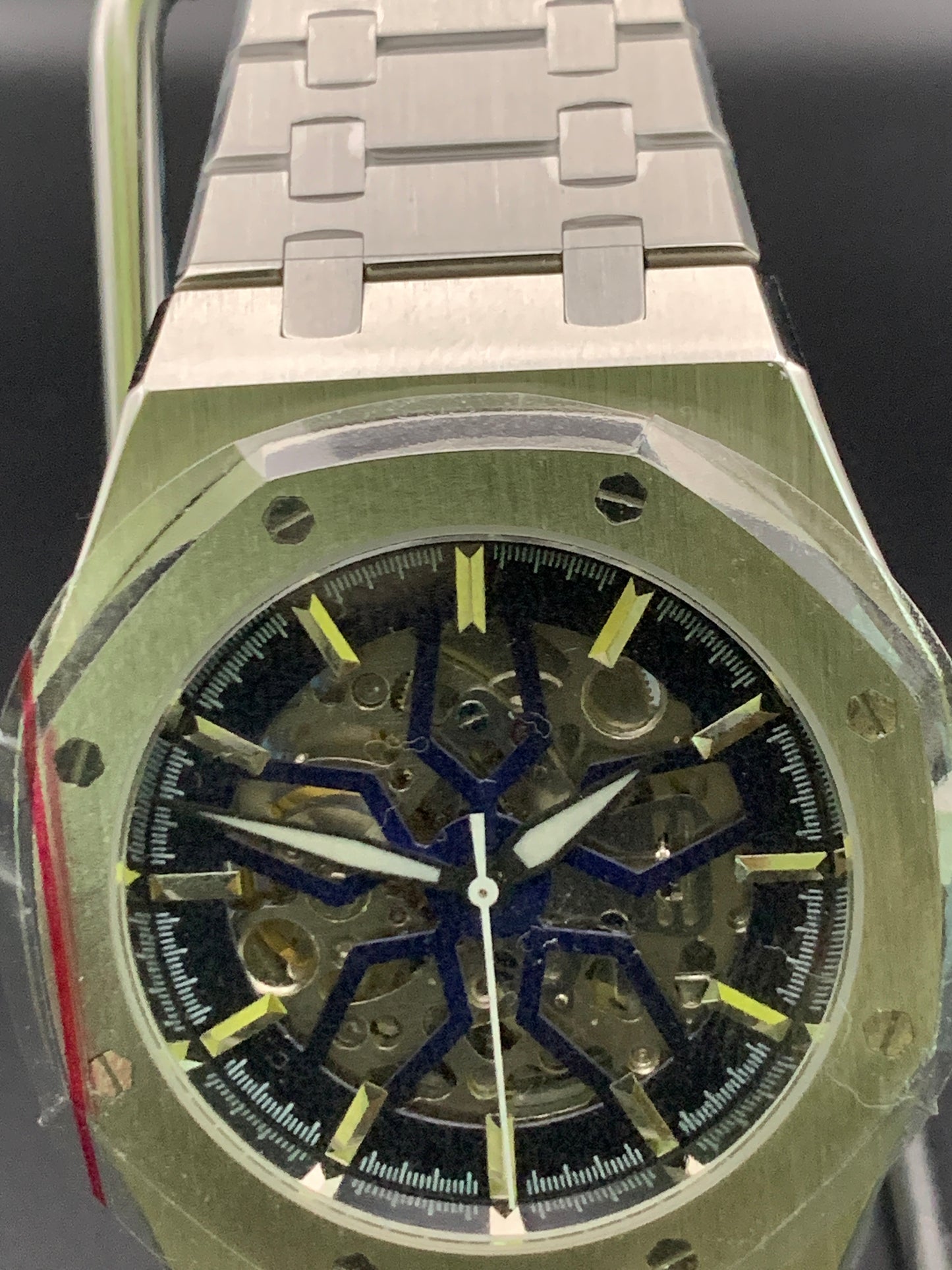 ‘Royal Oak’ style. Blueburst skeleton dial. Sapphire crystal. Seiko NH70. Bracelet and rubber strap included.
