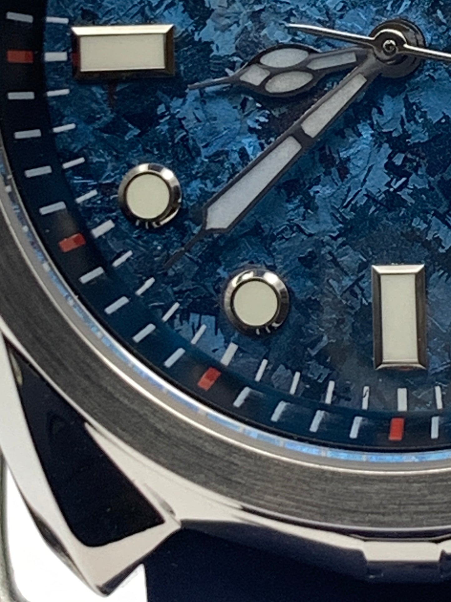 Miles. 39mm Stainless Steel case. AR coated sapphire crystal. Crystal titanium dial. Seiko NH35 automatic.