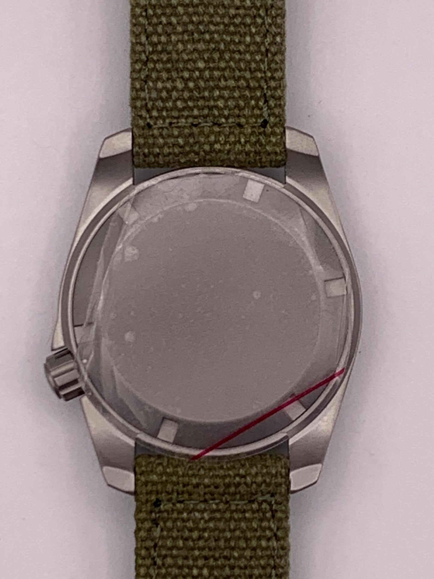 Outrider. 38mm bead blasted stainless steel. Crown at 3.8.  Sapphire crystal. Seiko NH35.