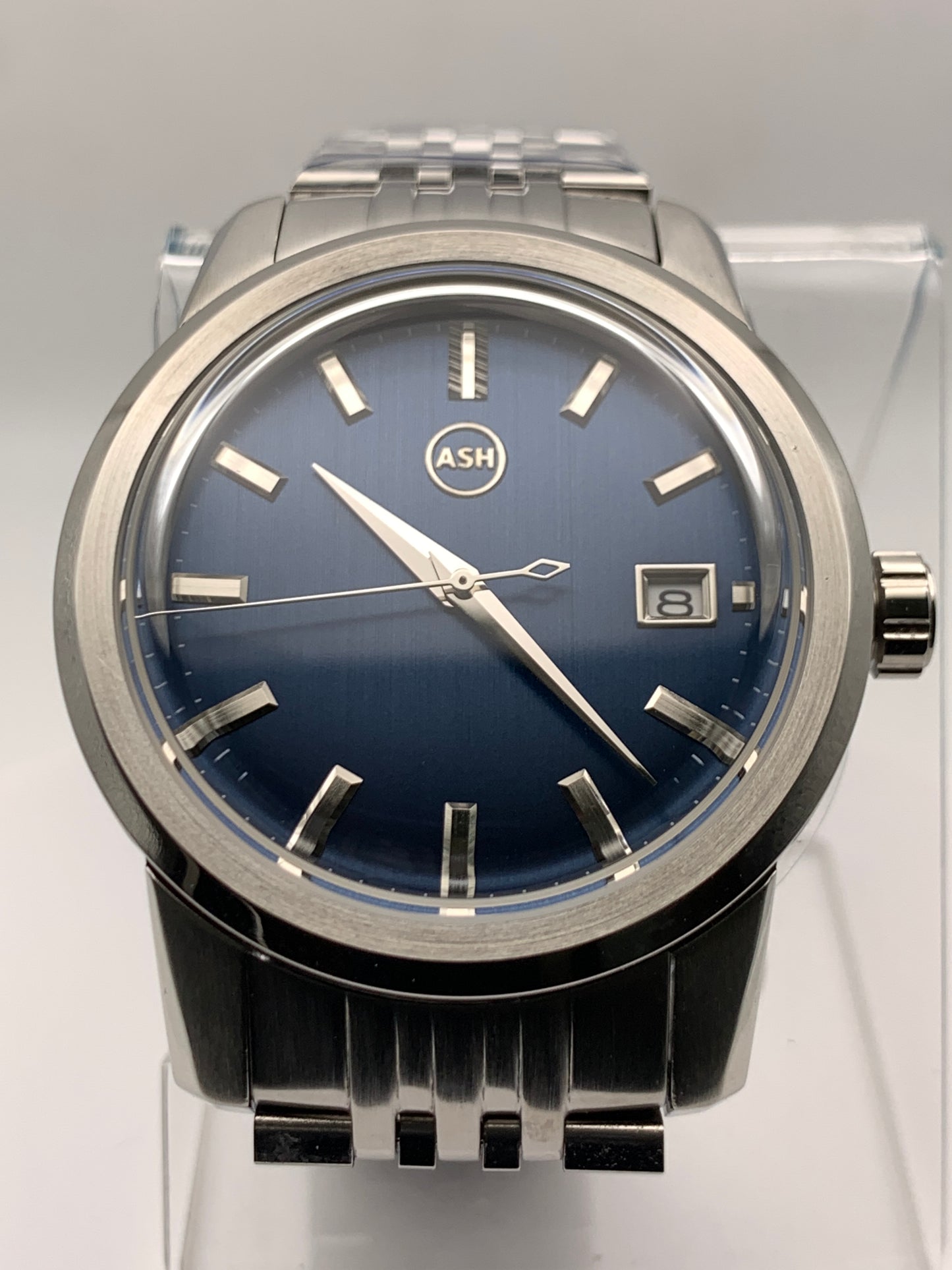 Nocturne. 40mm stainless steel case with matching bracelet. Box sapphire crystal. Seiko NH35