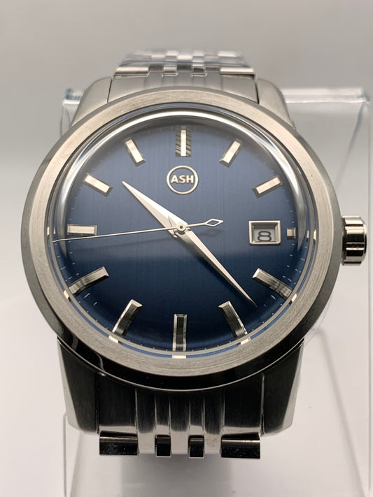 Nocturne. 40mm stainless steel case with matching bracelet. Box sapphire crystal. Seiko NH35